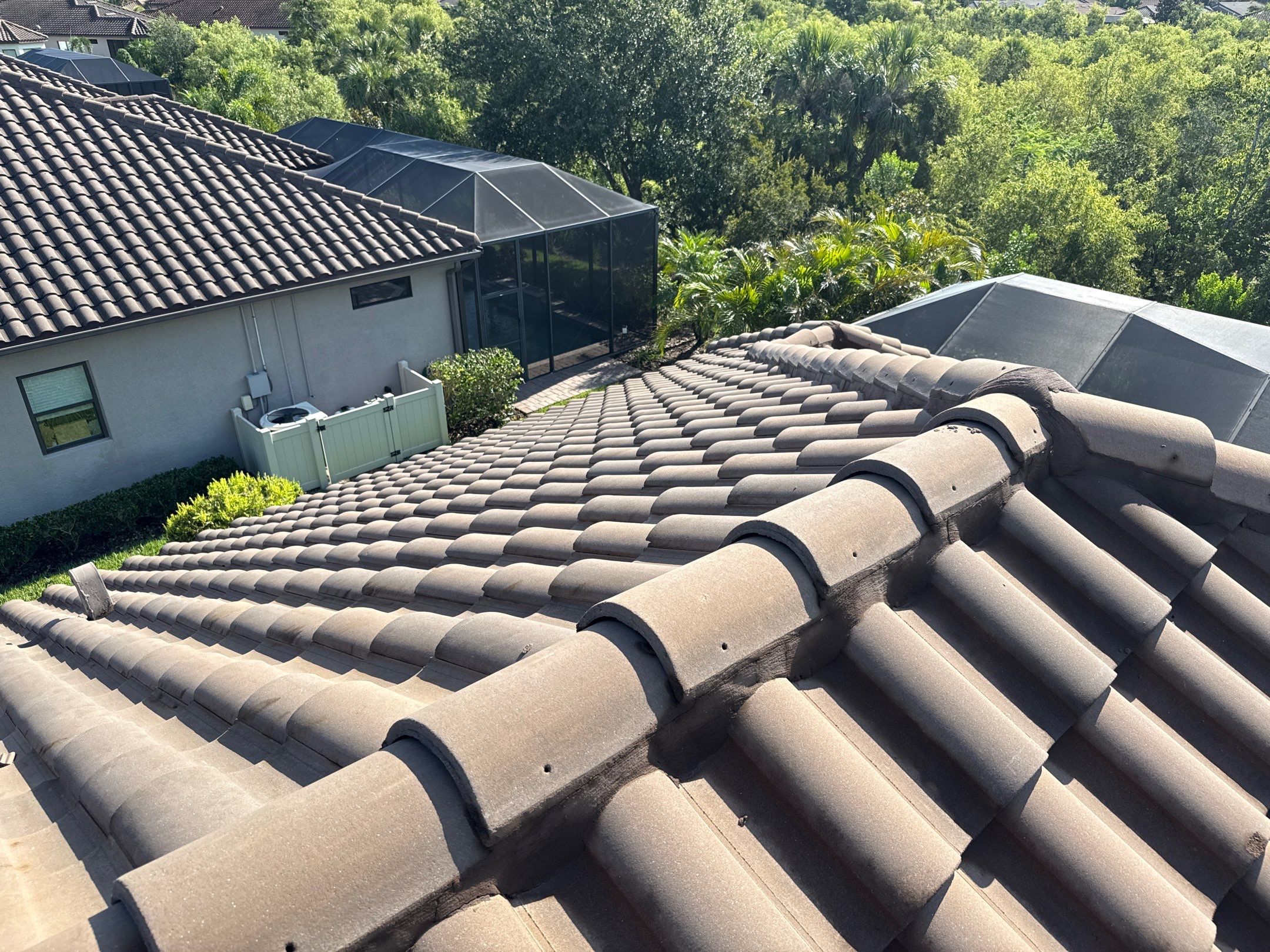 Concrete Tile Roof, Paver Driveway & Lanai Cleaning – Artisan Lakes Esplanade, Palmetto, FL by Sunshine AquaWash