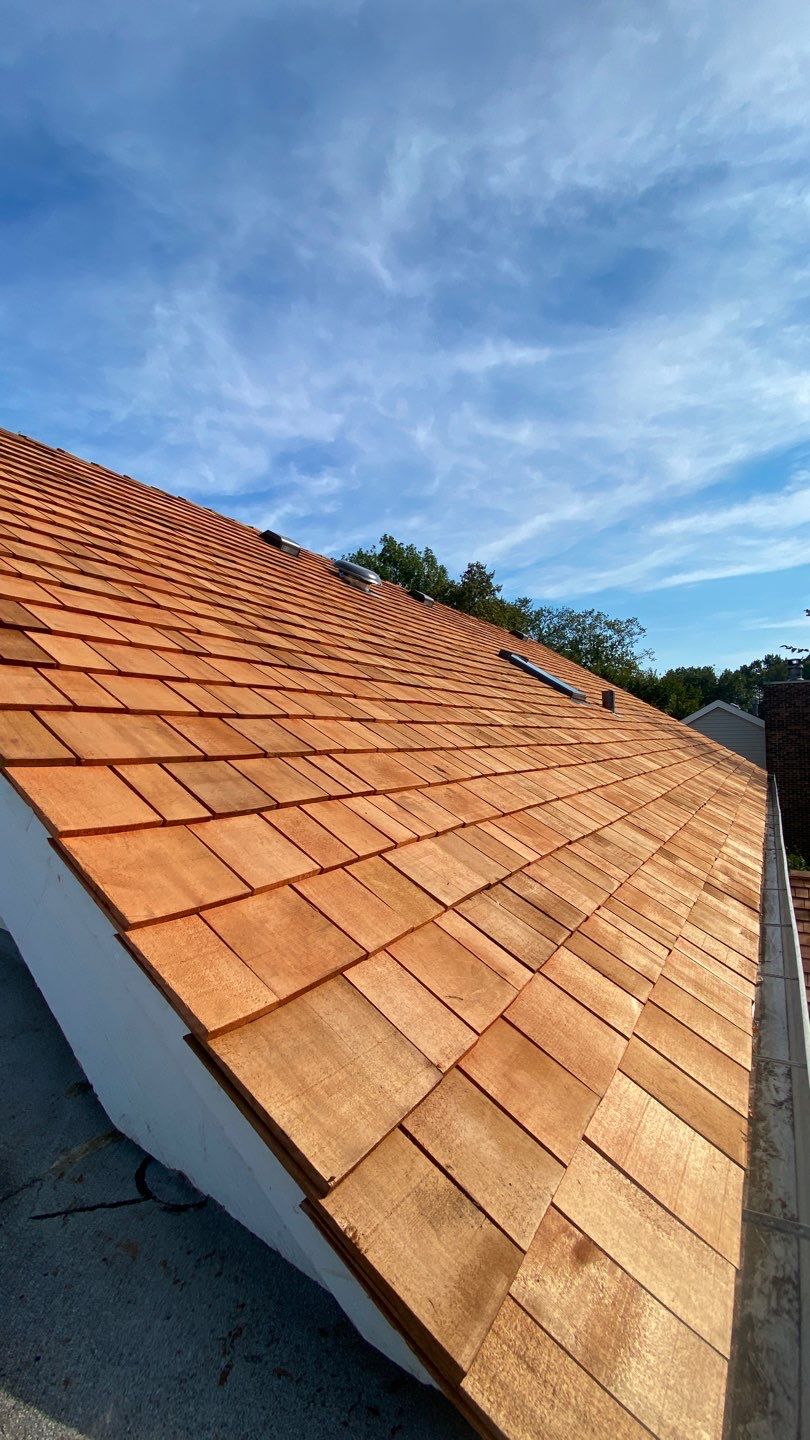 Cedar Shake Roof Replacement by Custom Installations