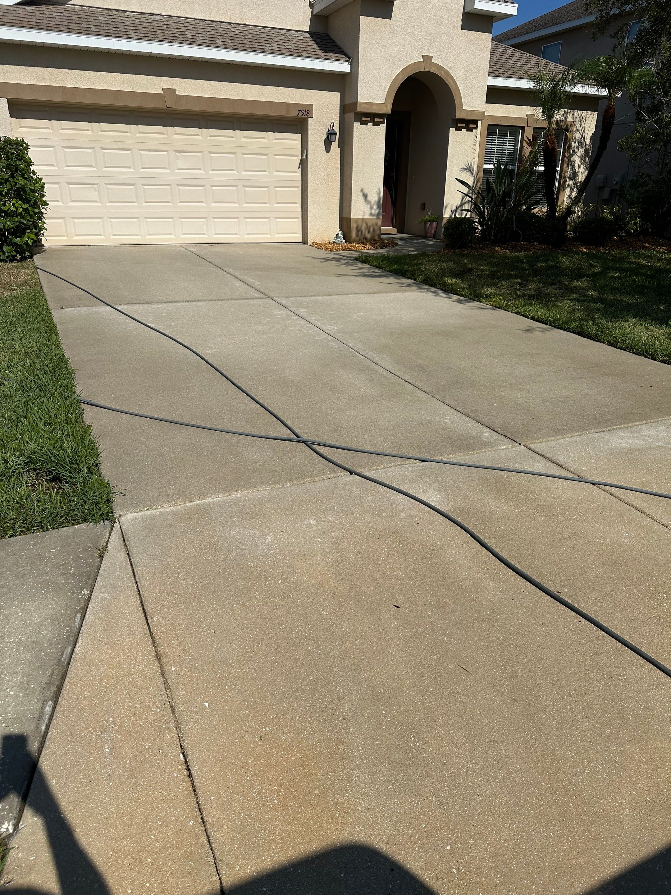 Asphalt Shingle Roof Soft Wash Cleaning & Concrete Pressure Washing in CopperStone Community, Parrish, FL by Sunshine AquaWash