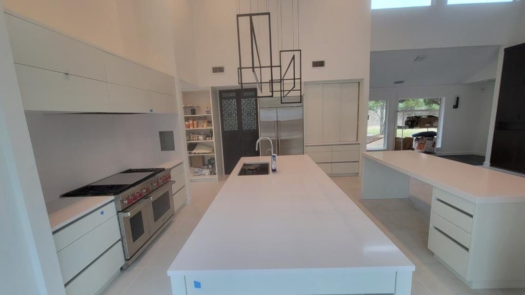 Modern & Clean Kitchen by SLM General Contractors & Roofing