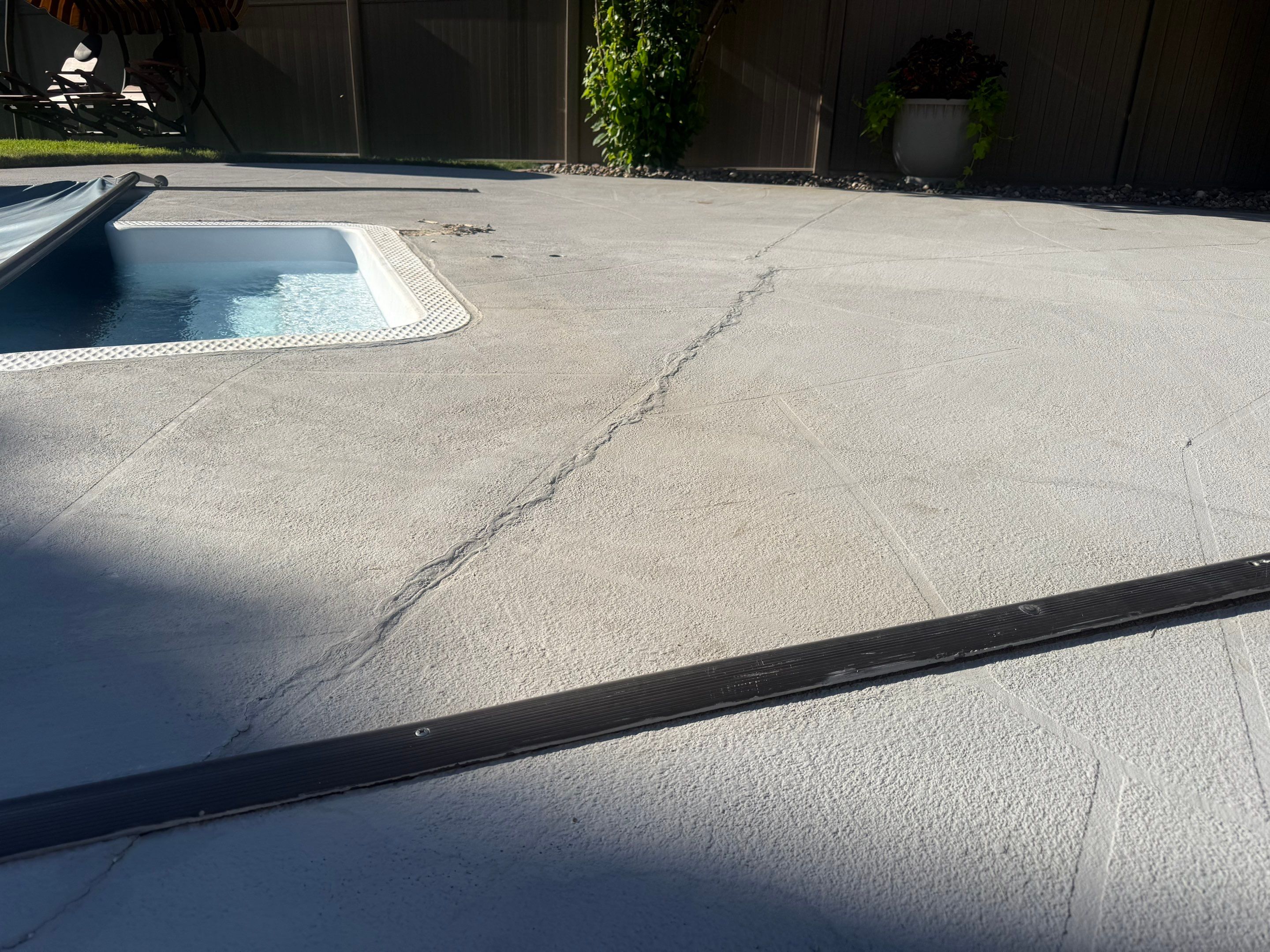 Residential Pool Deck Resurfacing in Sioux Falls by Select Painting, Coatings & Garage Cabinets
