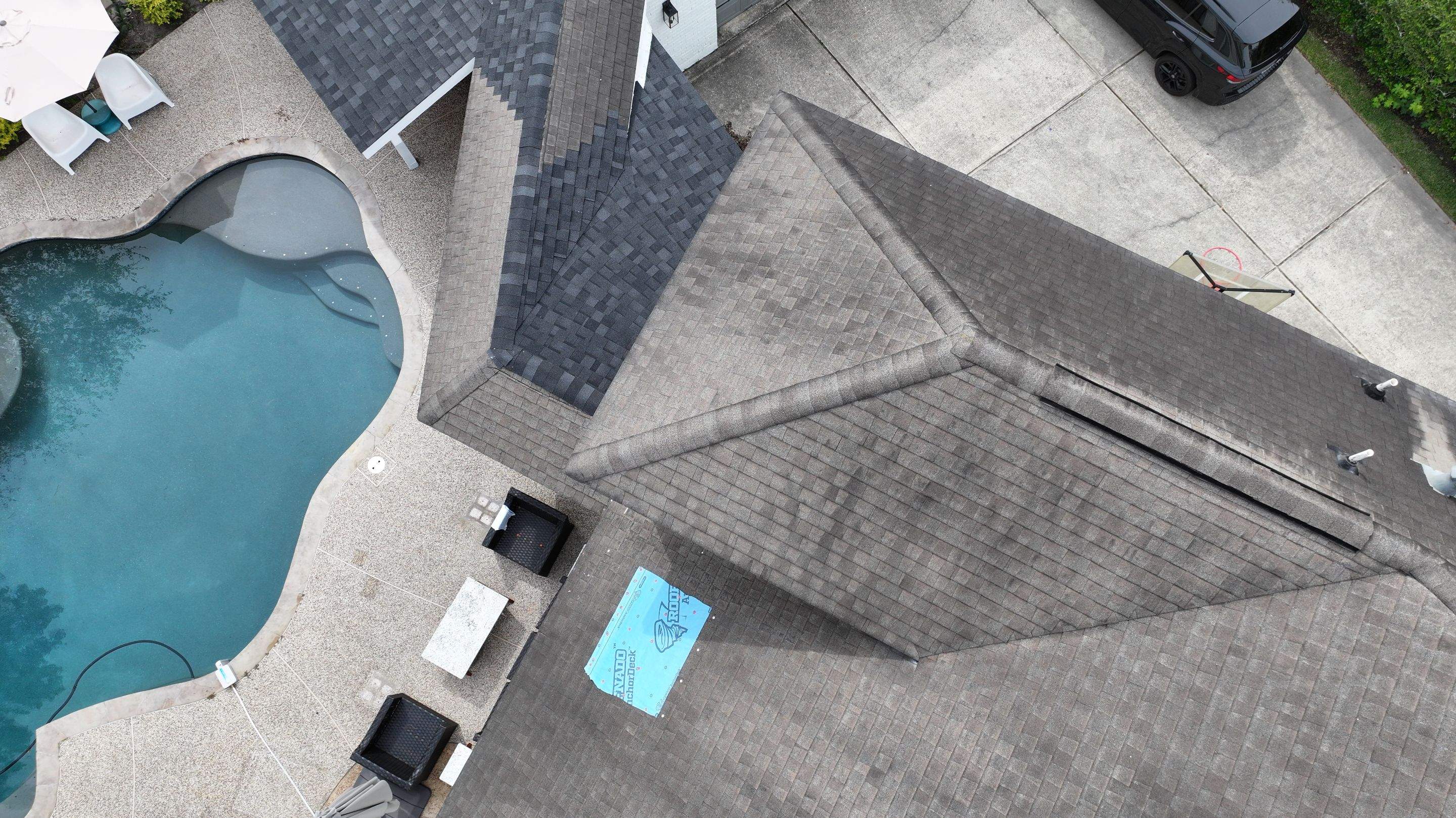 Roof Repair on Two-Story Estate Home — Spring, TX by PL Roofing & SB Roofing, LLC.