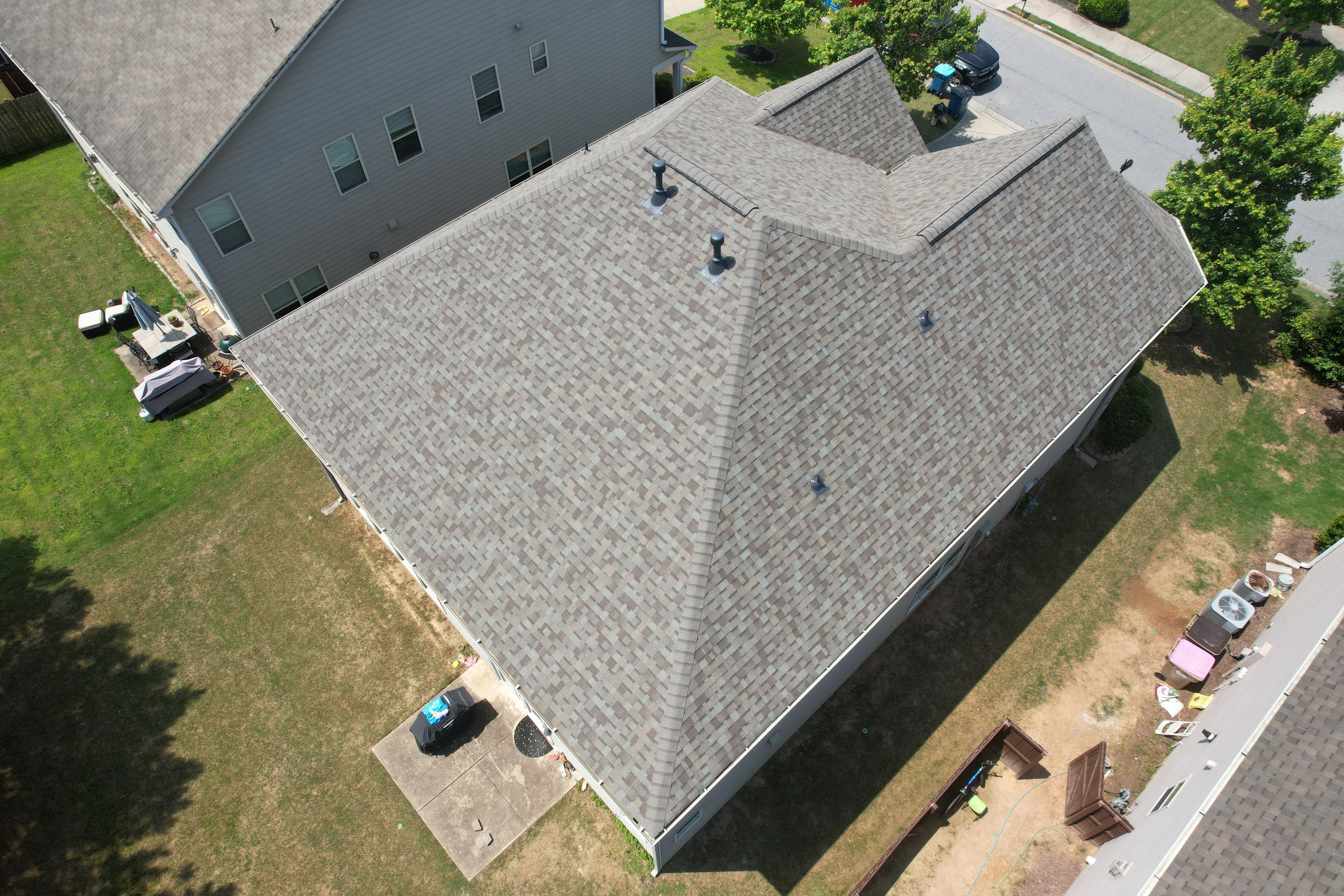 Residential Roof Replacement using Owens Corning TruDef Driftwood by Inspector Roofing and Restoration