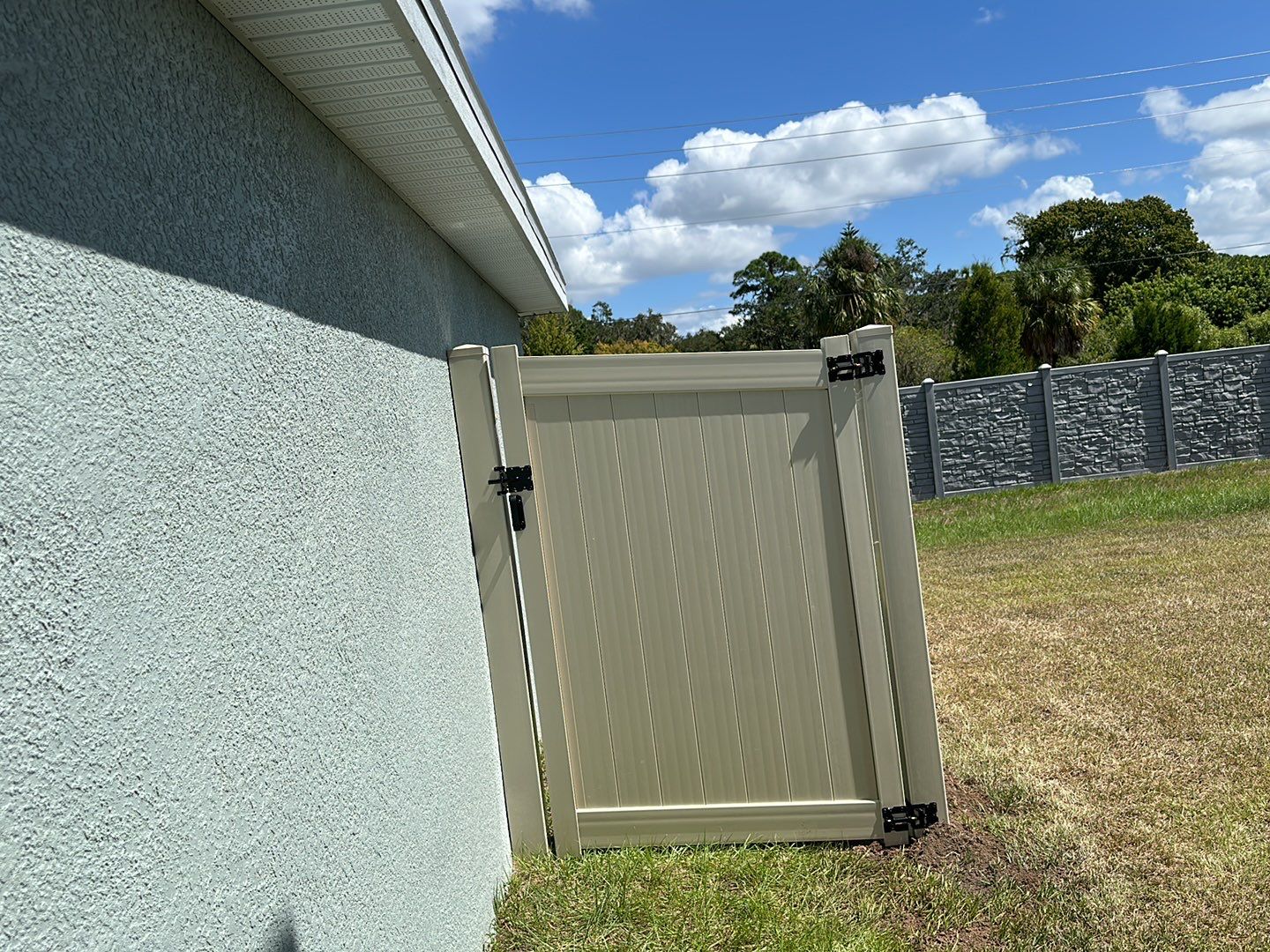 Vinyl Fence Installation using Tan Vinyl Privacy Fence by Asap fence and gates, LLC