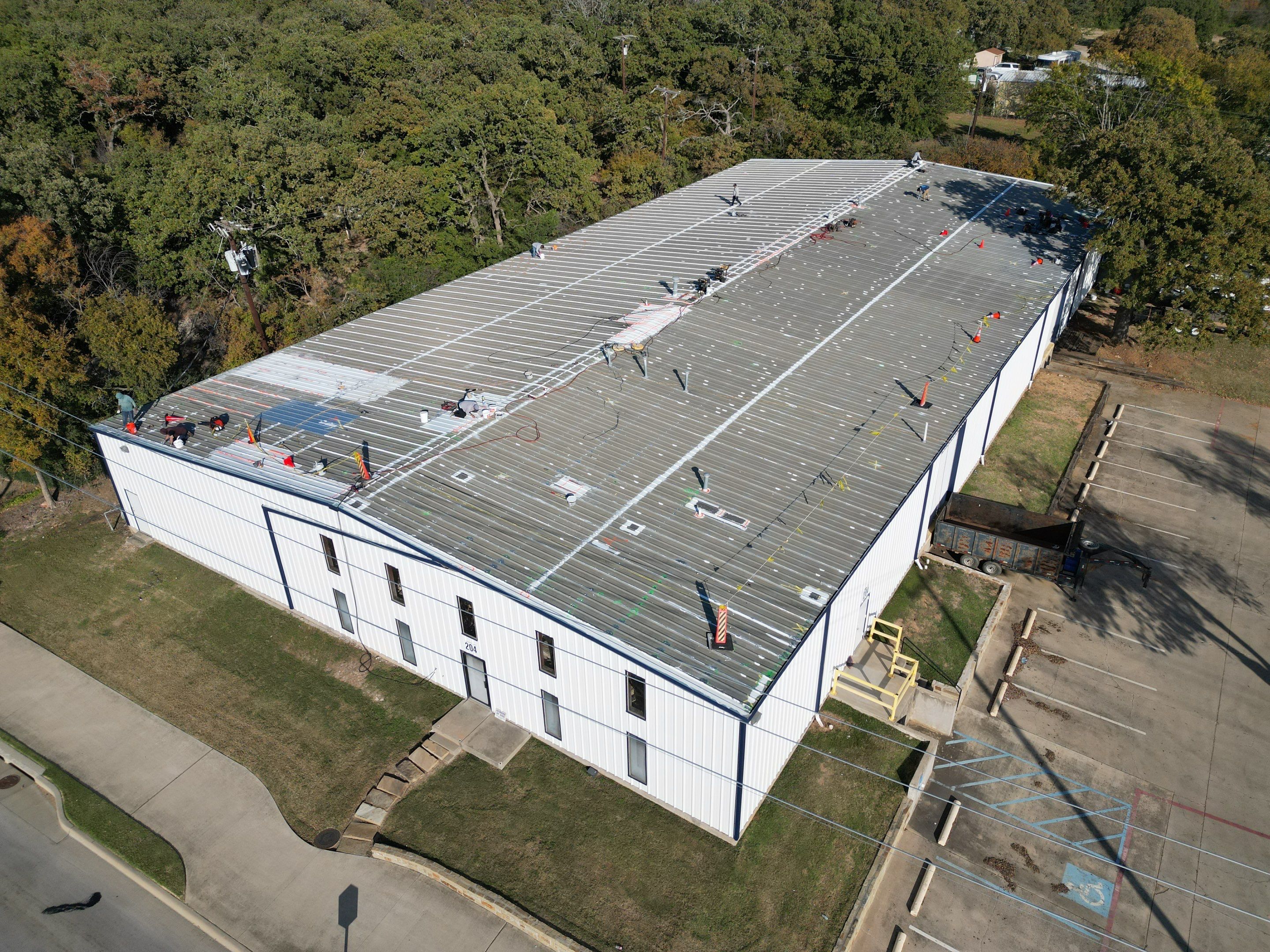 Silicone Coating Metal Rehab by First Out Roofing 