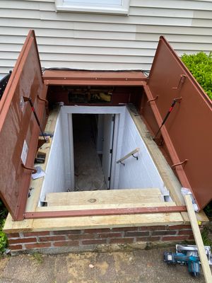 New Bilco doors to basement & new front porch posts