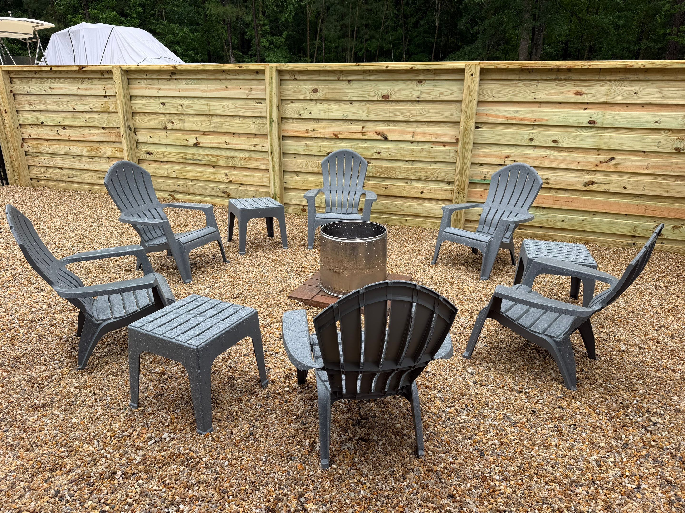 Modern Horizontal Wood Privacy Fence and Backyard Patio in Greenville by Superior Fence and Rail