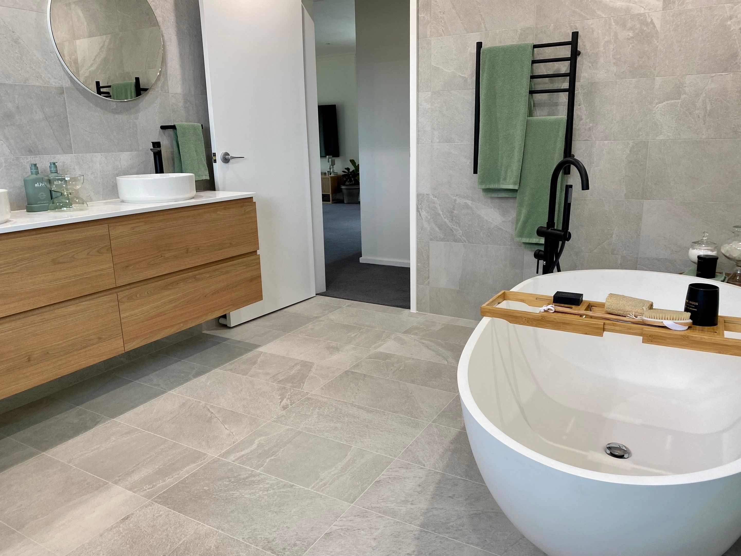 Bathroom Renovation using XROCK 36W White natural 300 x 600 by Re-seal Bathrooms