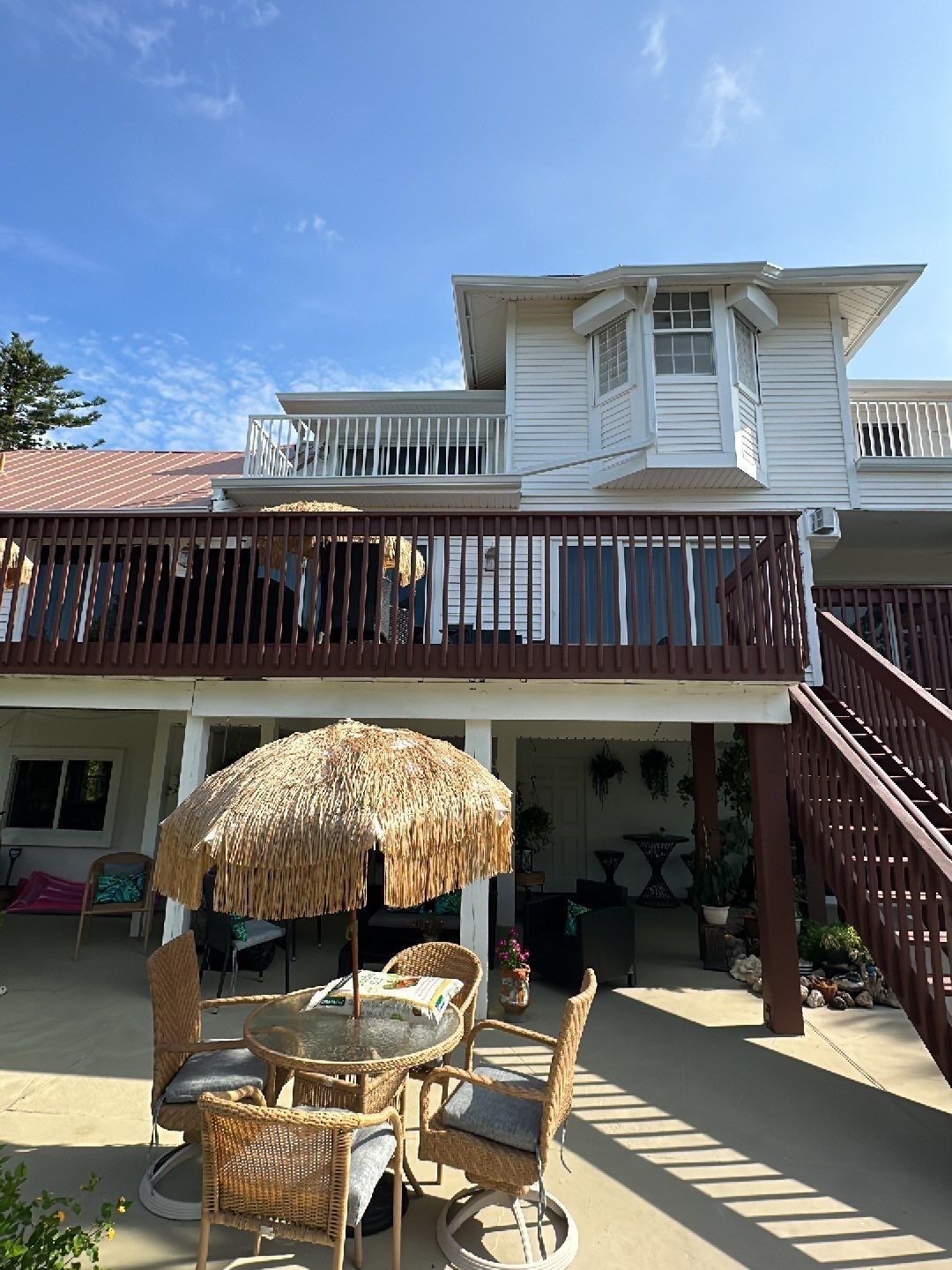 White K-Style Gutters Installed with White Downspouts in Sanibel FL by Gutter Professors