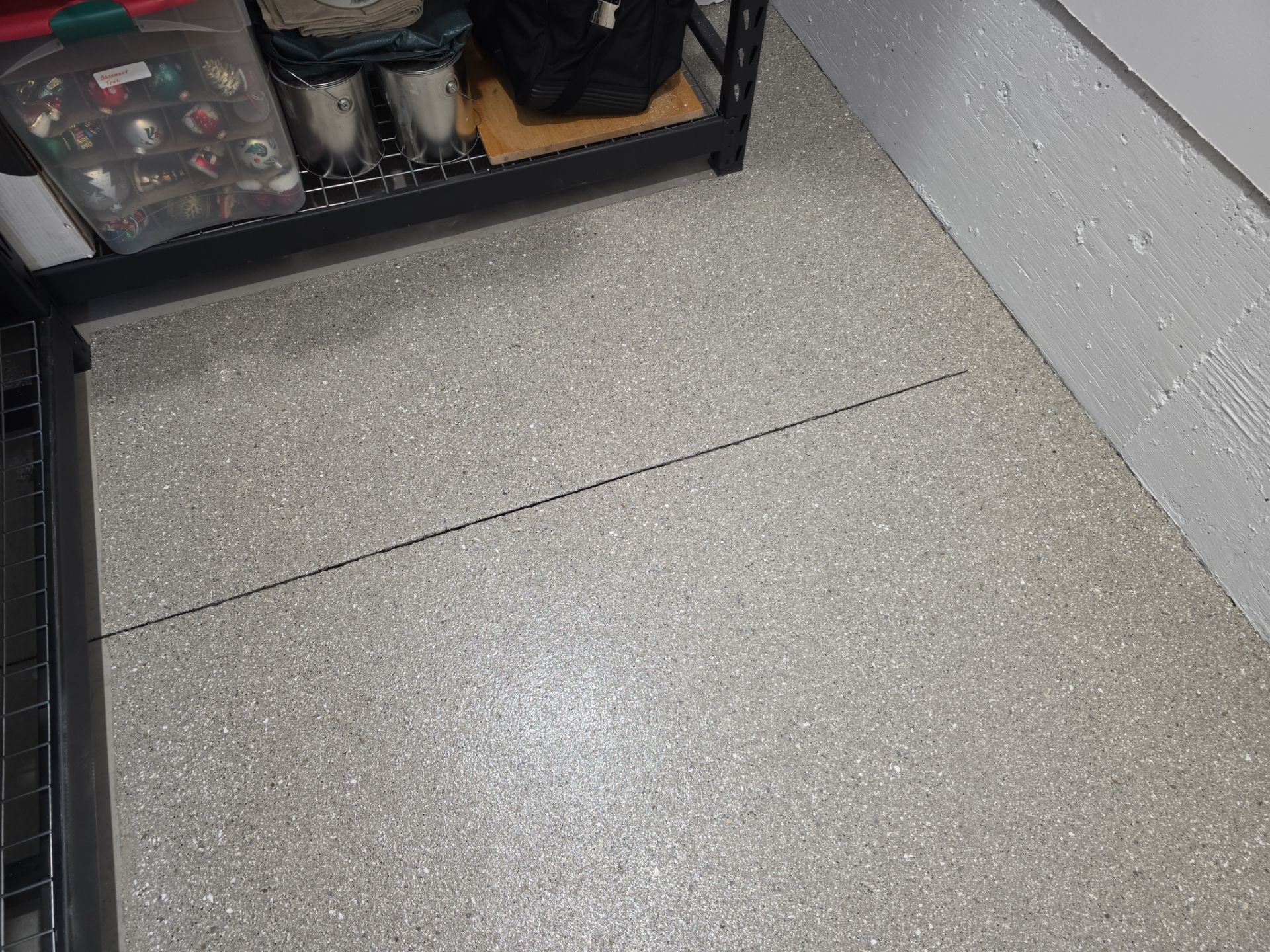 Moscow Garage Transformation Featuring Travertine Hybrid Polyaspartic Coating by Croc Coatings, LLC