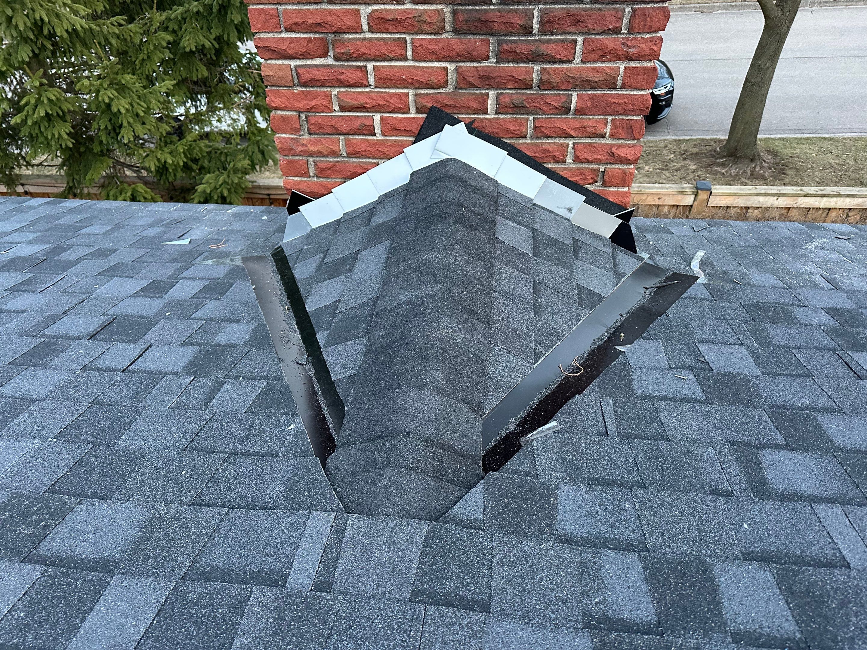 Project in Burlington by The Roofing Crew