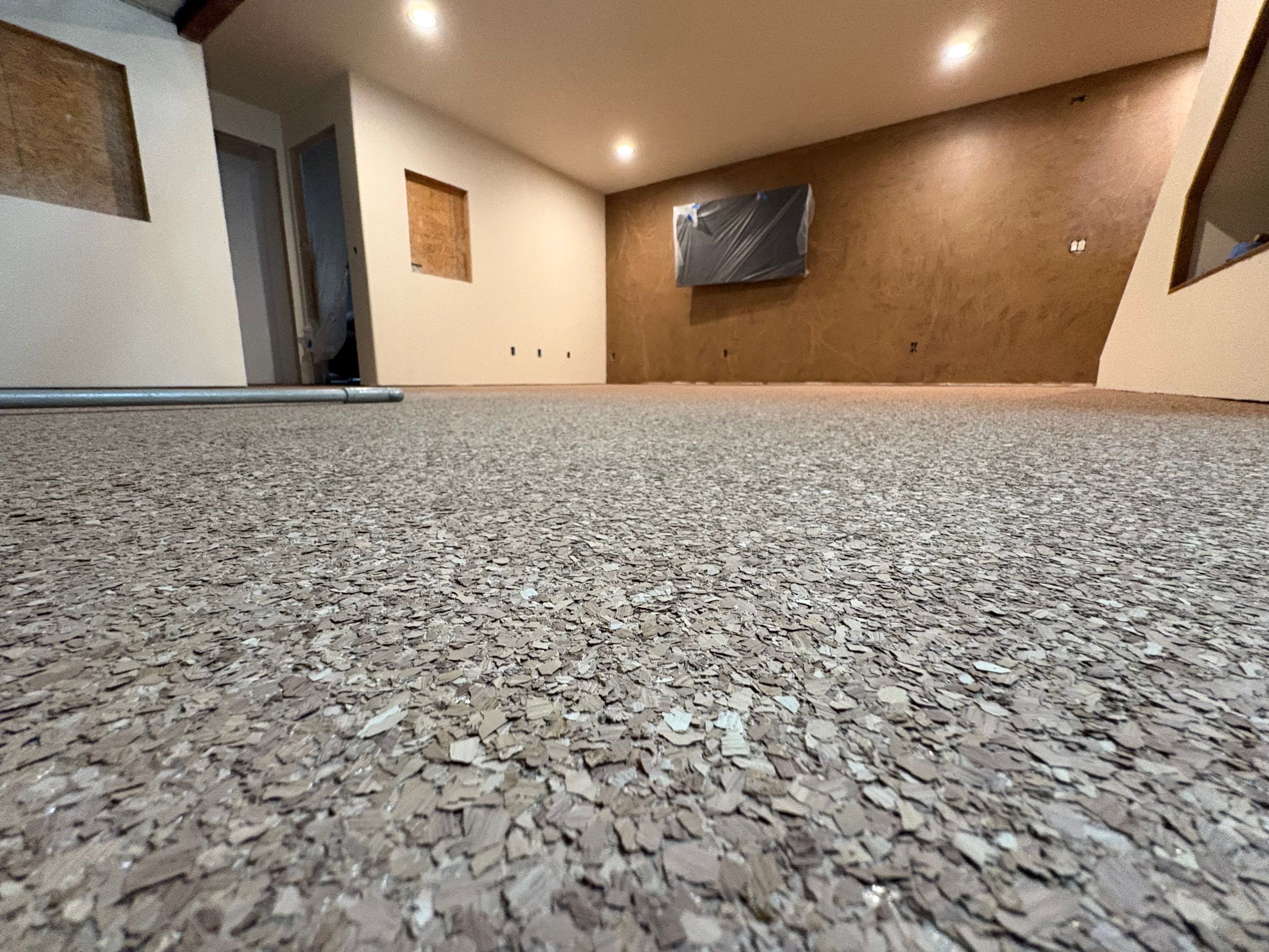 Custom Chip Concrete Coating for Colman Basement and Garage by Select Painting, Coatings & Garage Cabinets