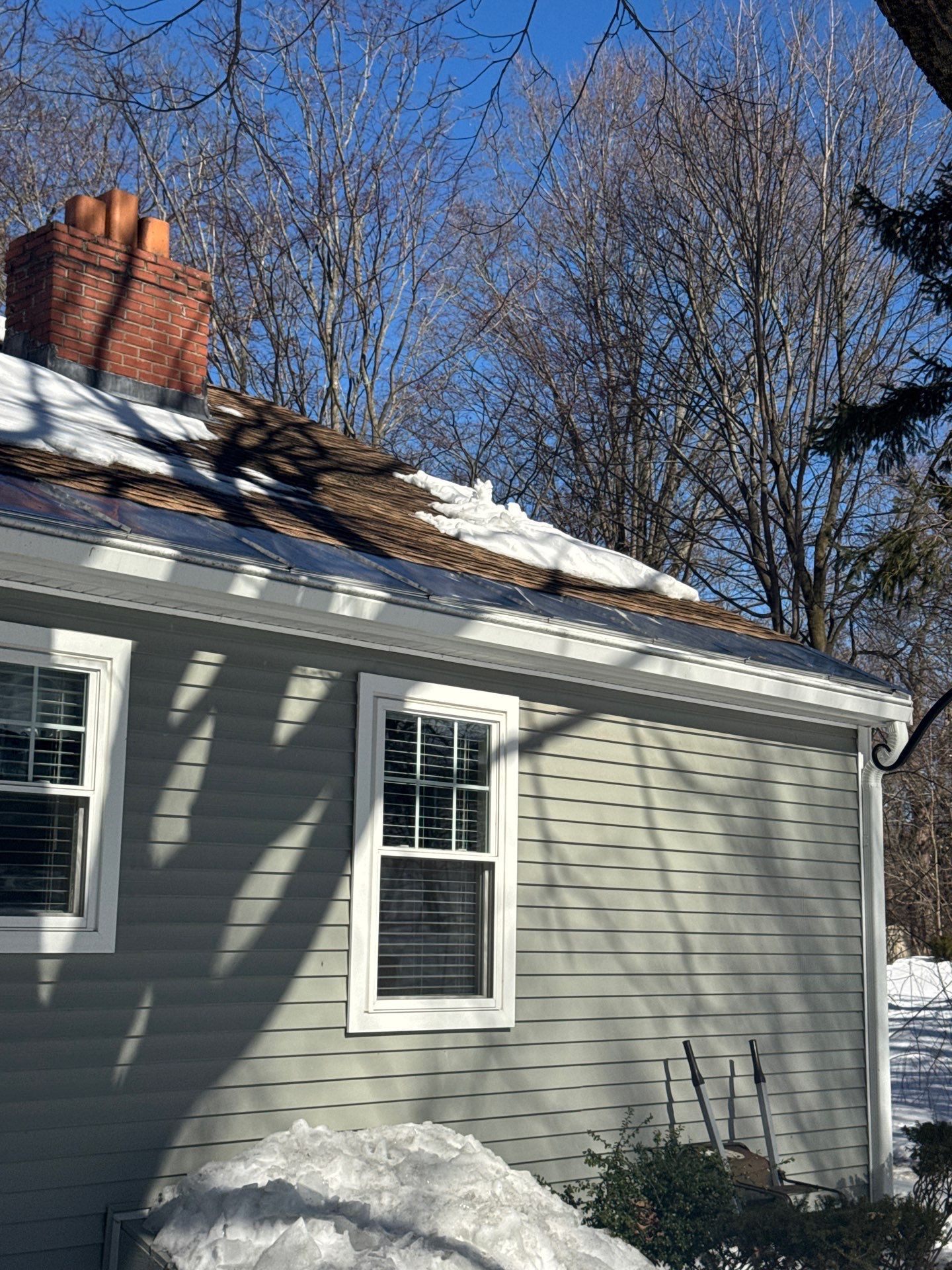 Snow/Ice Belt & Ice Dam Removal Project in Woburn by Mighty Dog Roofing of Greater Middlesex County