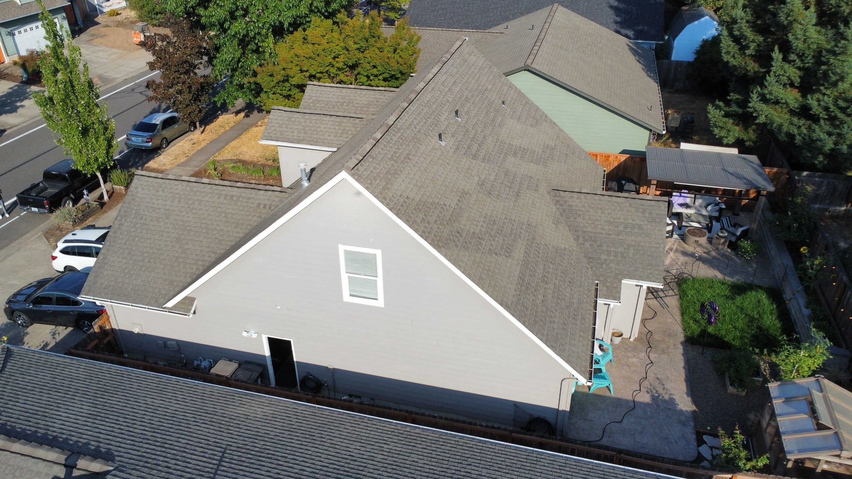 Granite Black Residential Roof Replacement by Orezona Building & Roofing Company, Inc.
