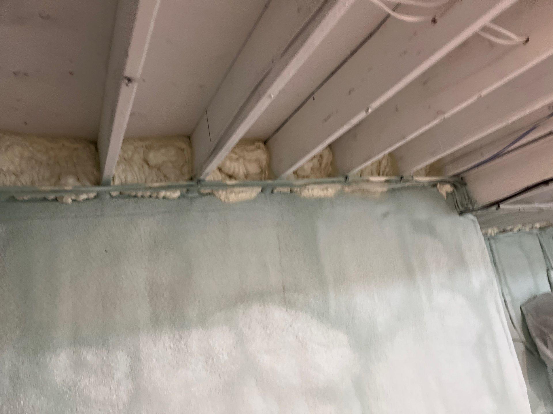 Basement Exterior Walls using Closed Cell Spray Foam by NYS Foam & Energy