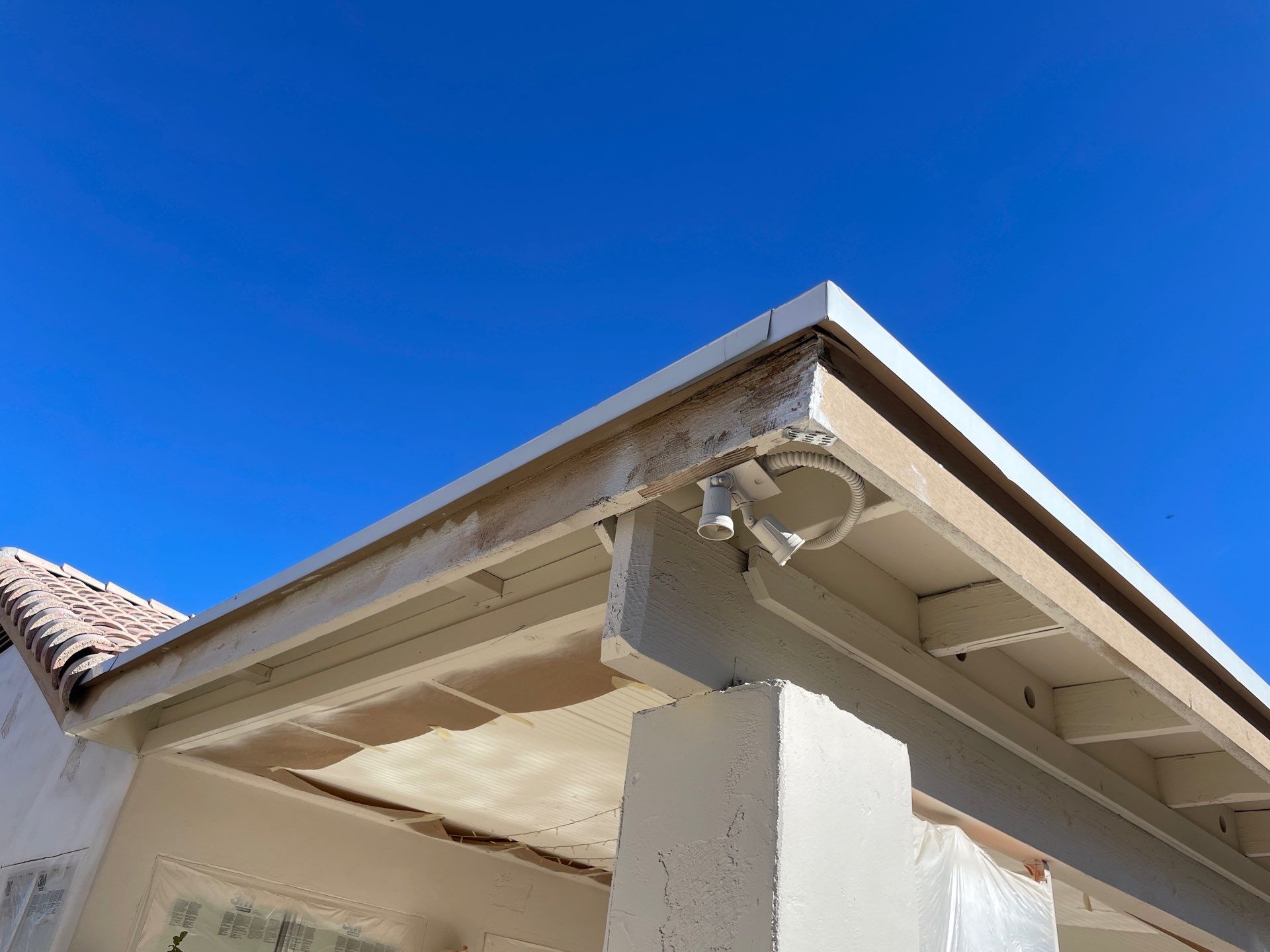 Gazzo - A Beautiful Home Exterior Transformation in Scottsdale, AZ with C&M Primer and Sherwin Williams Paints by Double G Painting Contractors, LLC