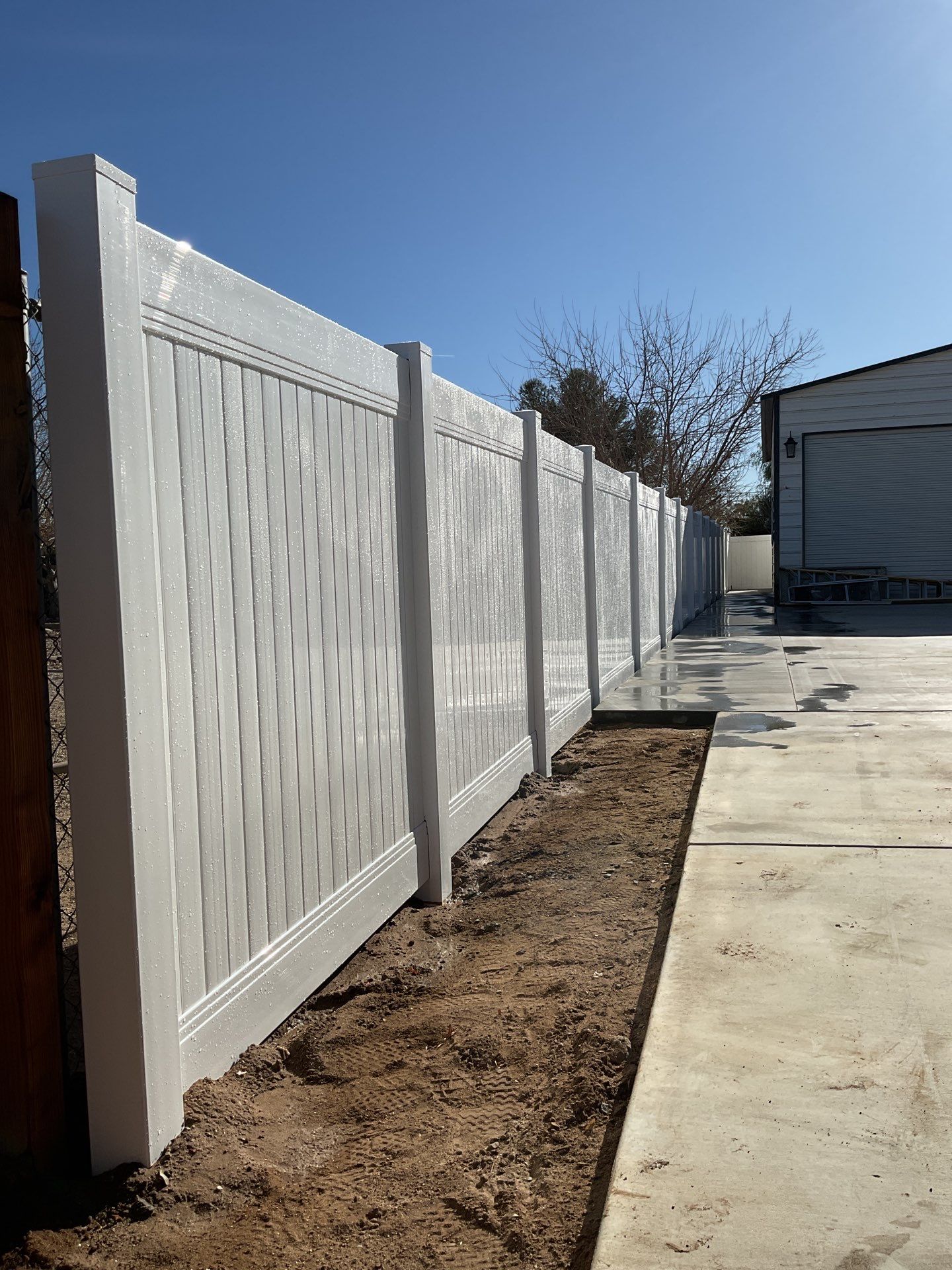 Fence Installation with Vinyl by Fence Guys Inc.