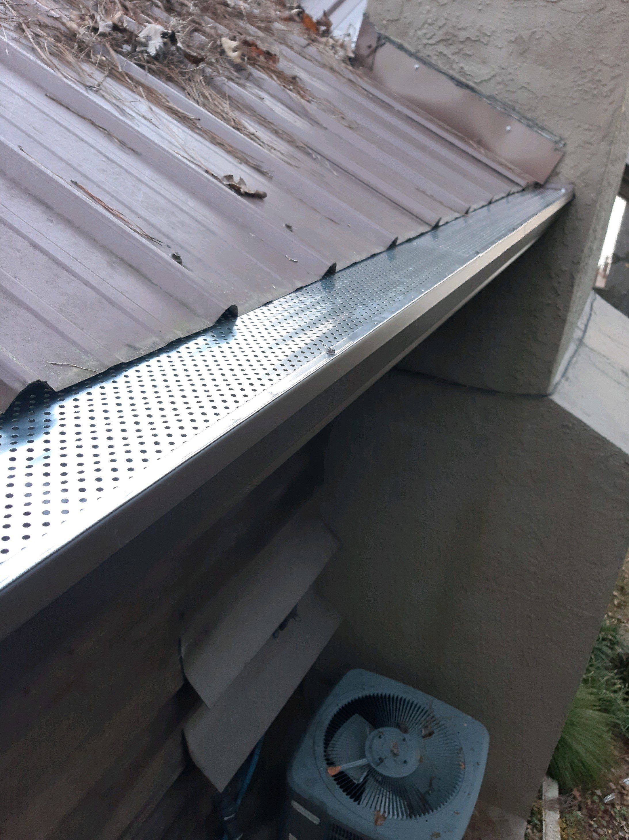 Gutter Installation using Royal Brown K-Style Seamless Gutters and LeafBlaster Pro Gutter Guards by Gutter Professors