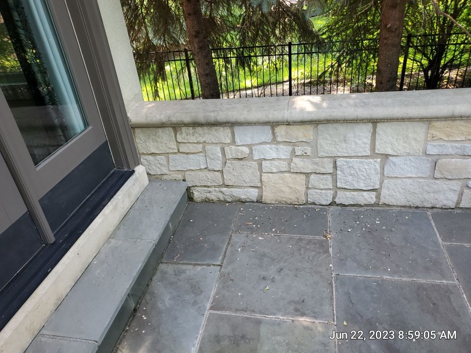 Northbrook, IL stucco home soft wash and stone cleaning by Northern Power Washing LLC.