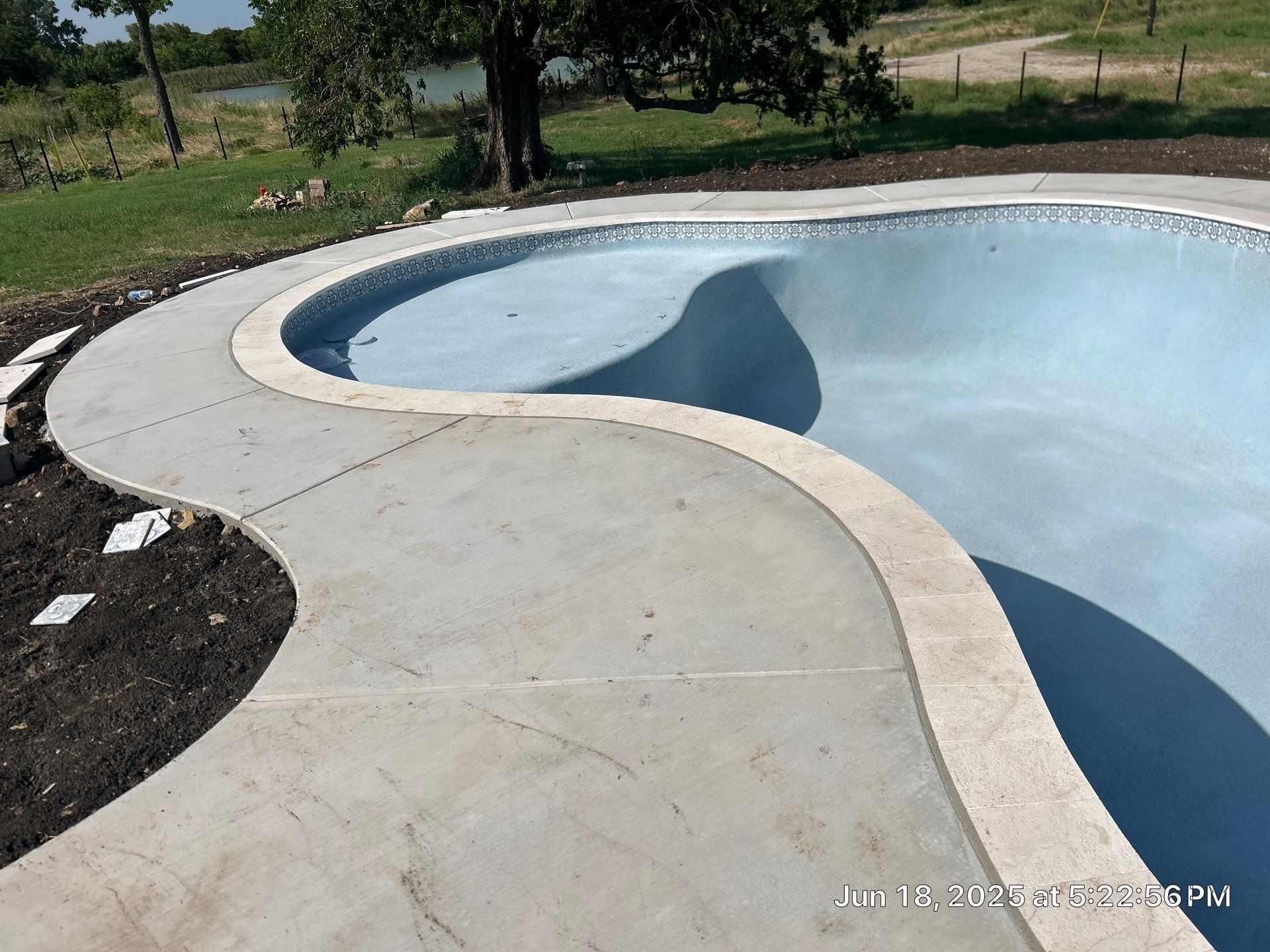 Freeform Pool with Tanning Ledge by Pinnacle Pools and Spas - DFW