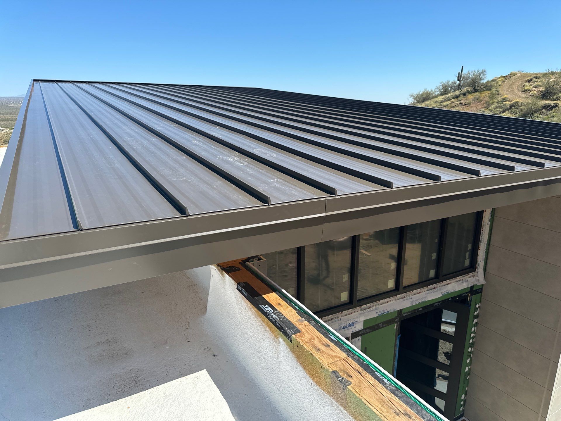 Dark Bronze Standing Seam by Reimagine Roofing