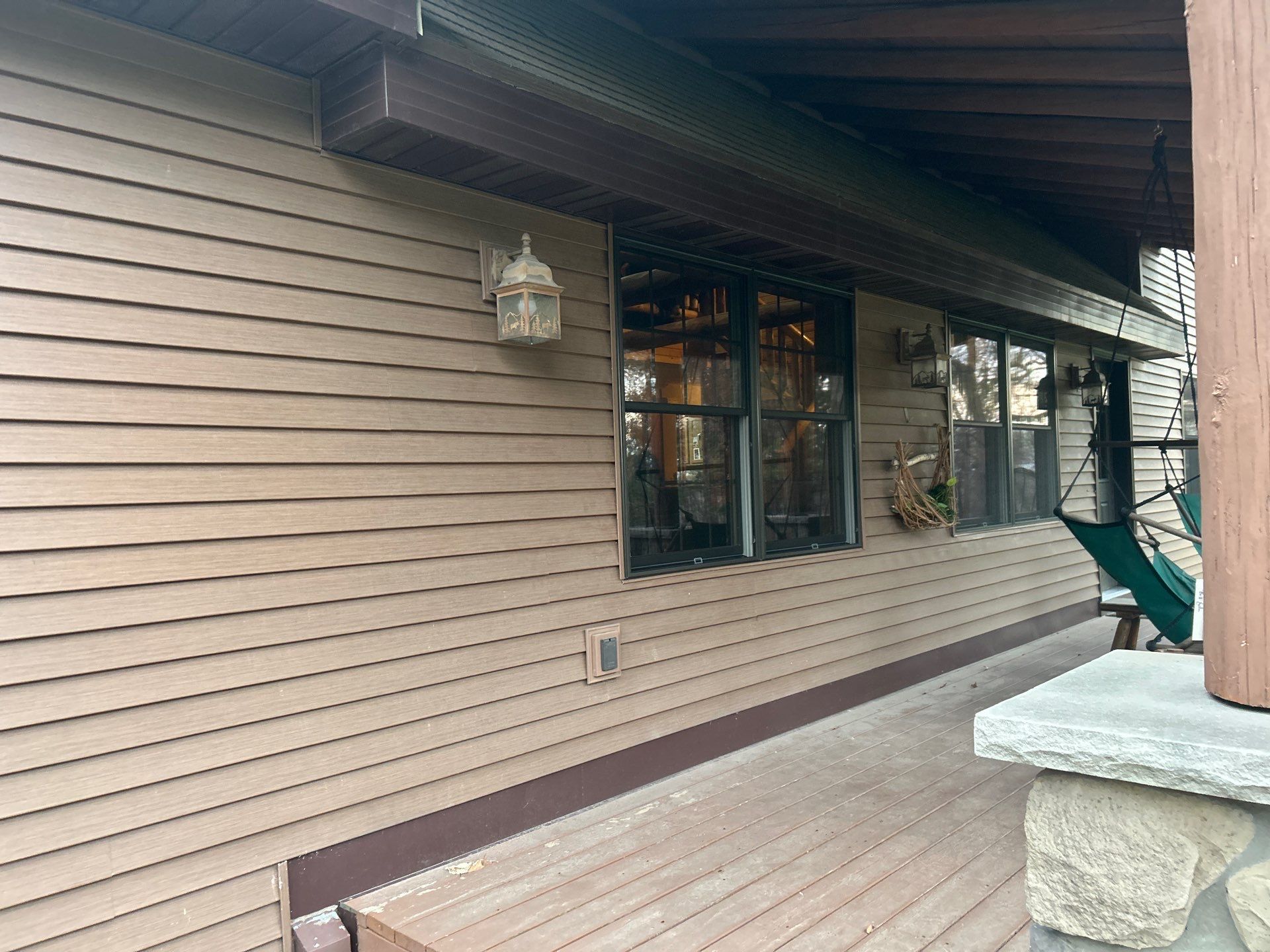 Pella Window installation using Pella Lifestyle wood/Aluminum window by United Windows and Siding LLC