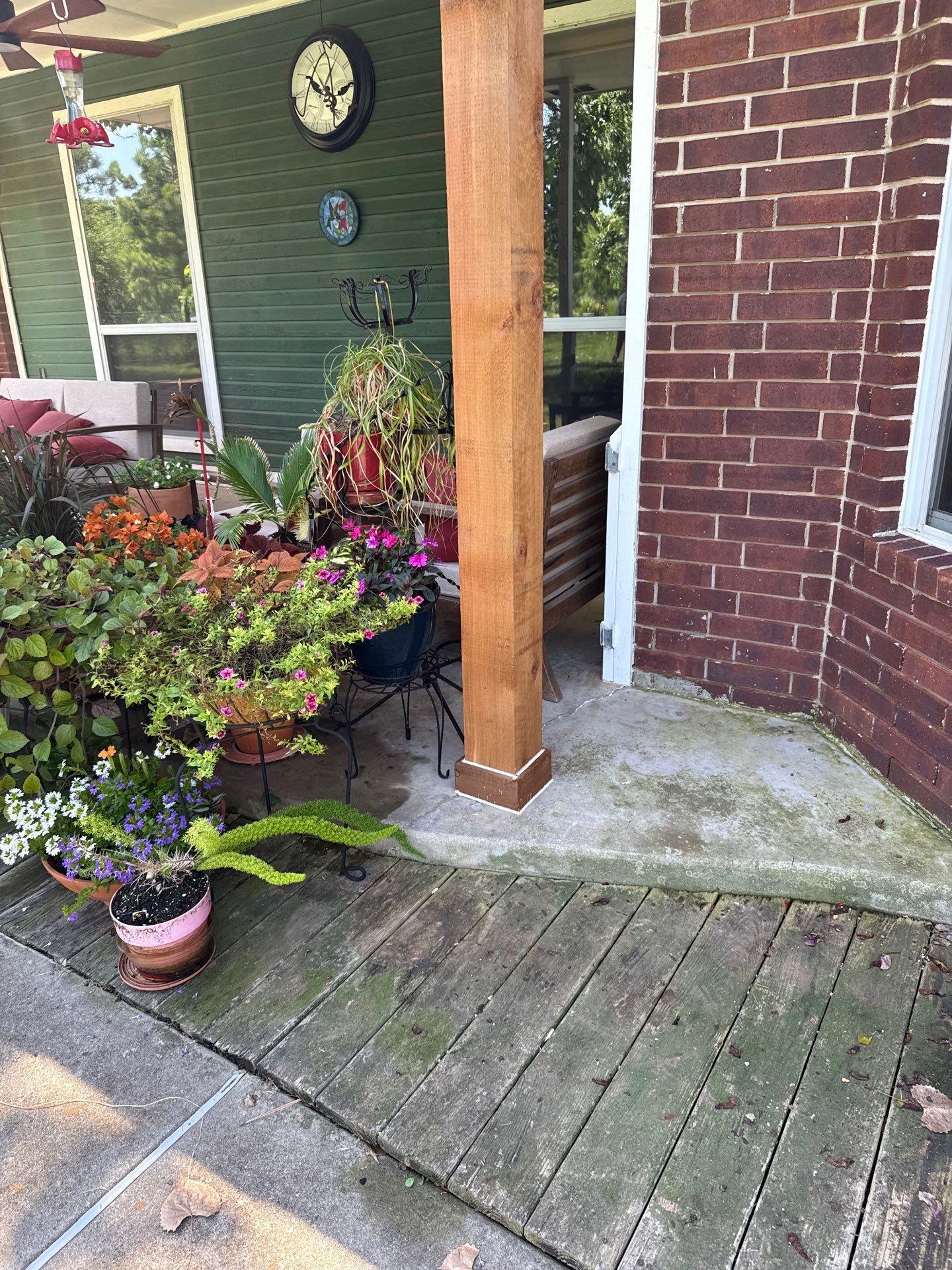 cedar post replacement & exterior painting in Choctaw by McCann's Roofing and Construction