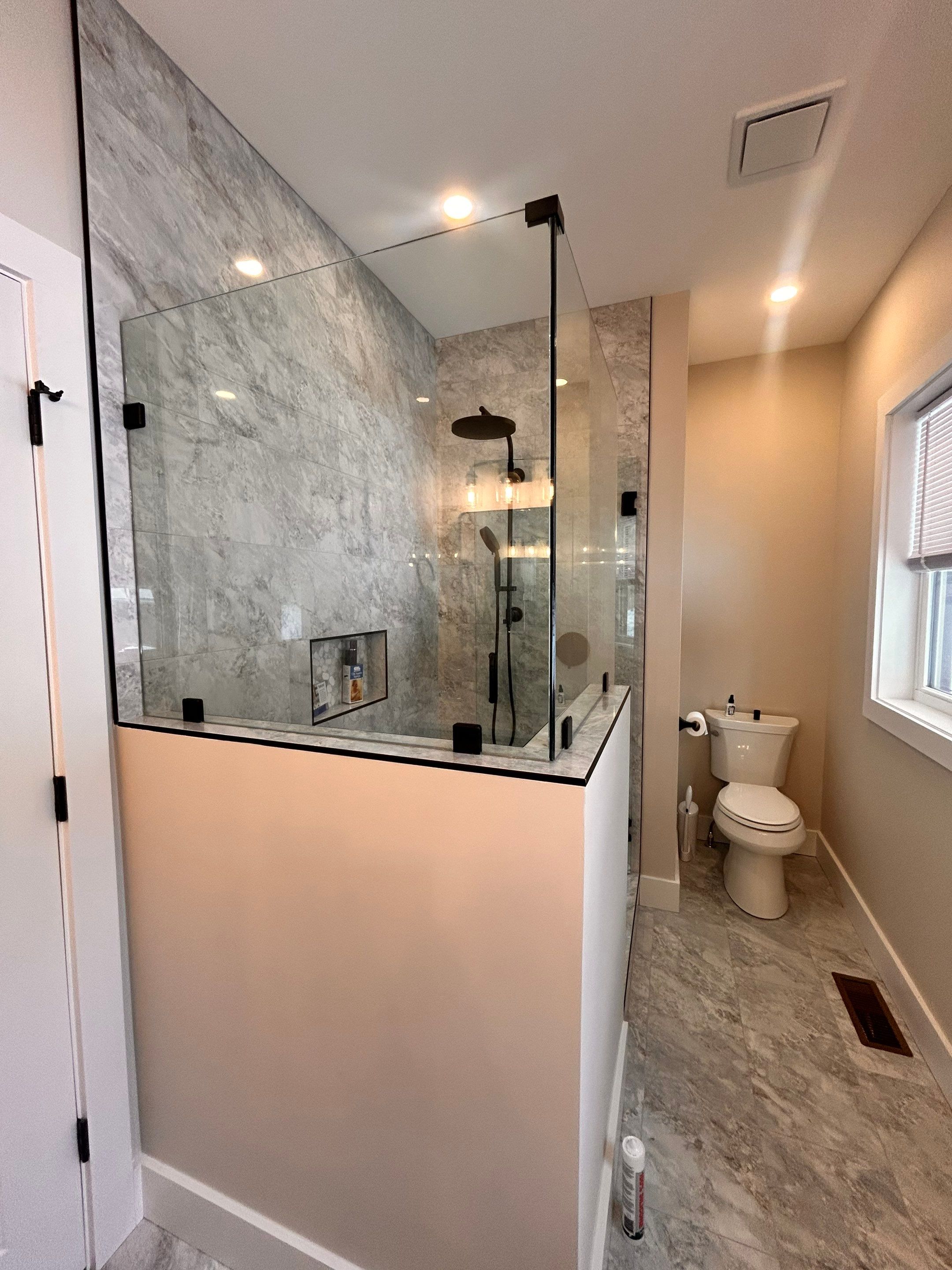 Frameless Shower Enclosure using Tempered Shower Glass by Cheshire Glass Company