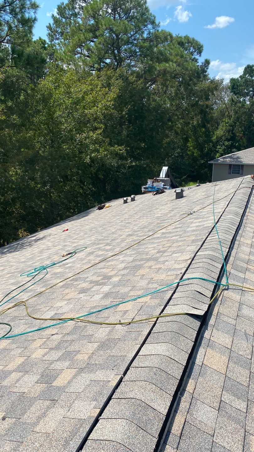 Residential Roofing Installation using Roof Replacement by American Roofing & Construction LLC