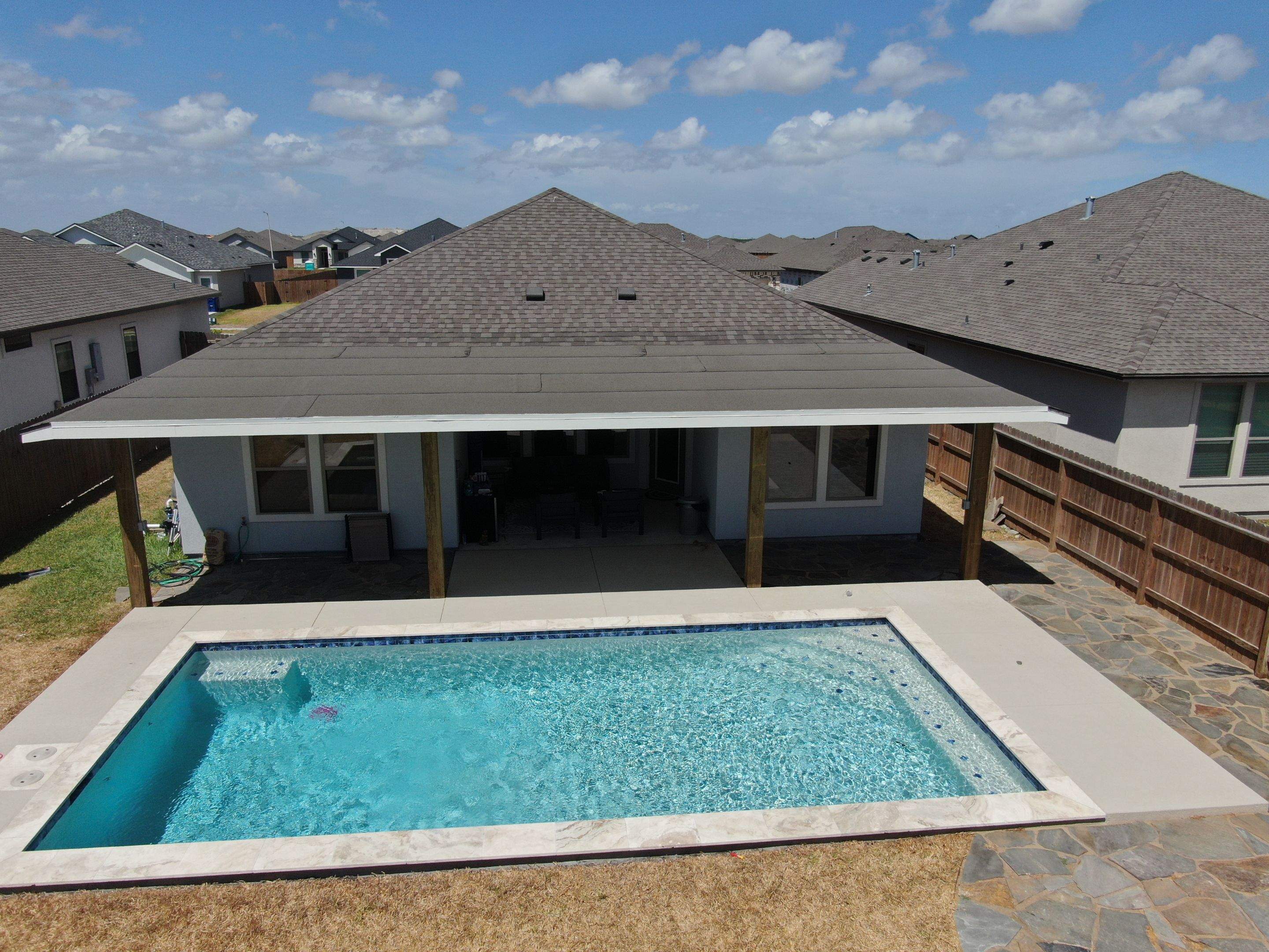 Patio Pool Cover by Bayfront Roofing and Construction