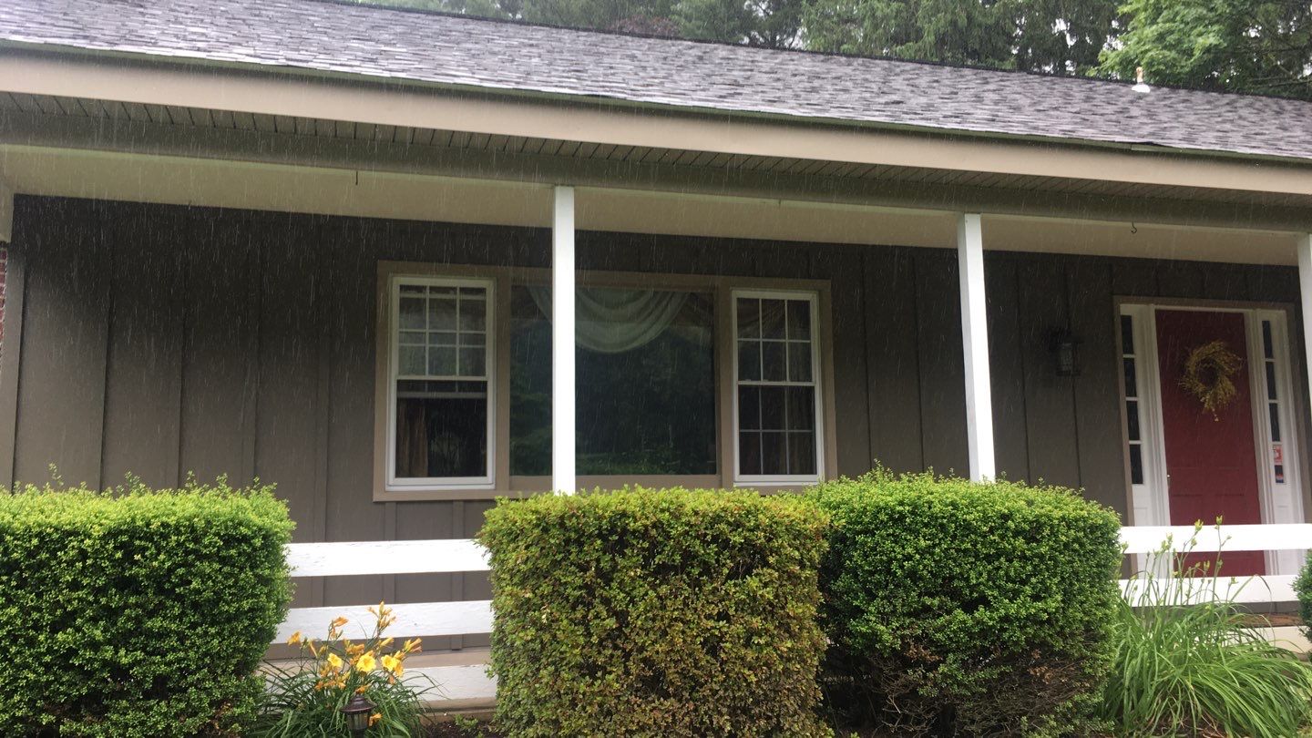 Gutter and Siding Replacement by American Home Contractors