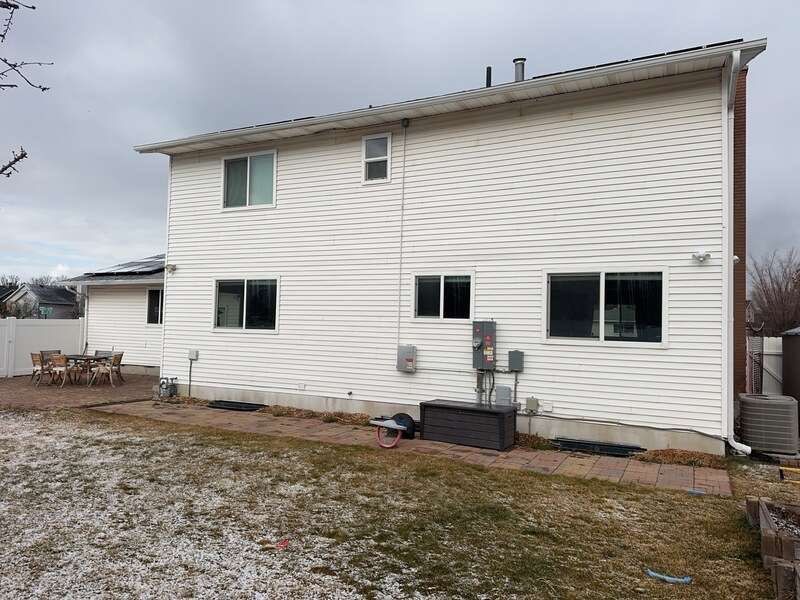 Sandy | Strategic Hardie & Vinyl Integration | Cobble Stone & Desert Sand by Ideal Siding Utah