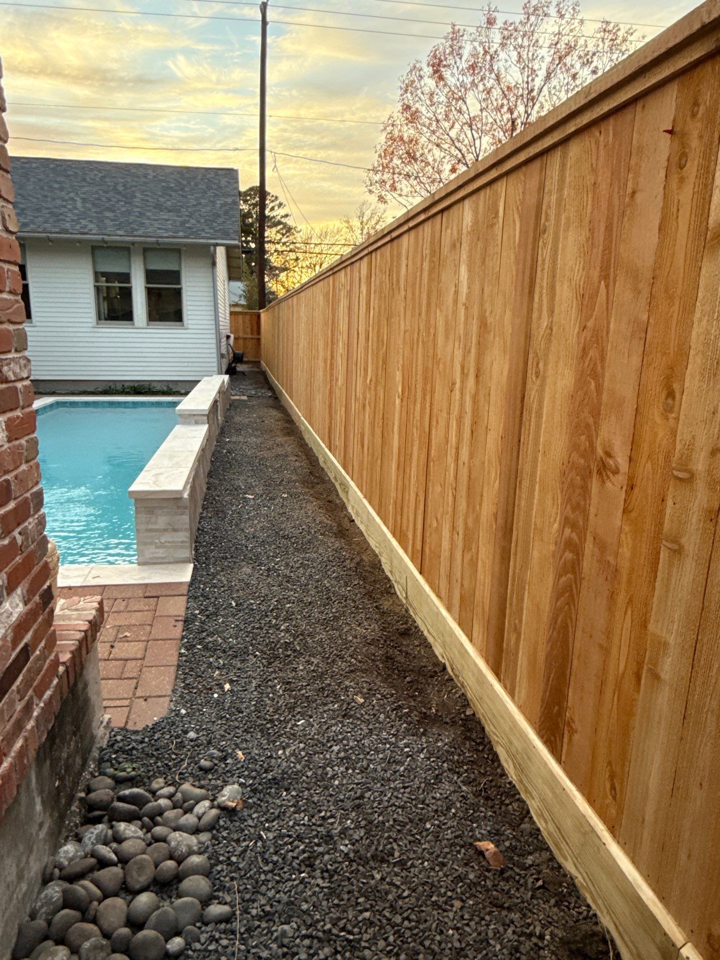 Durable Fence & Gate Installation with Premium Stain by Tim's Fences