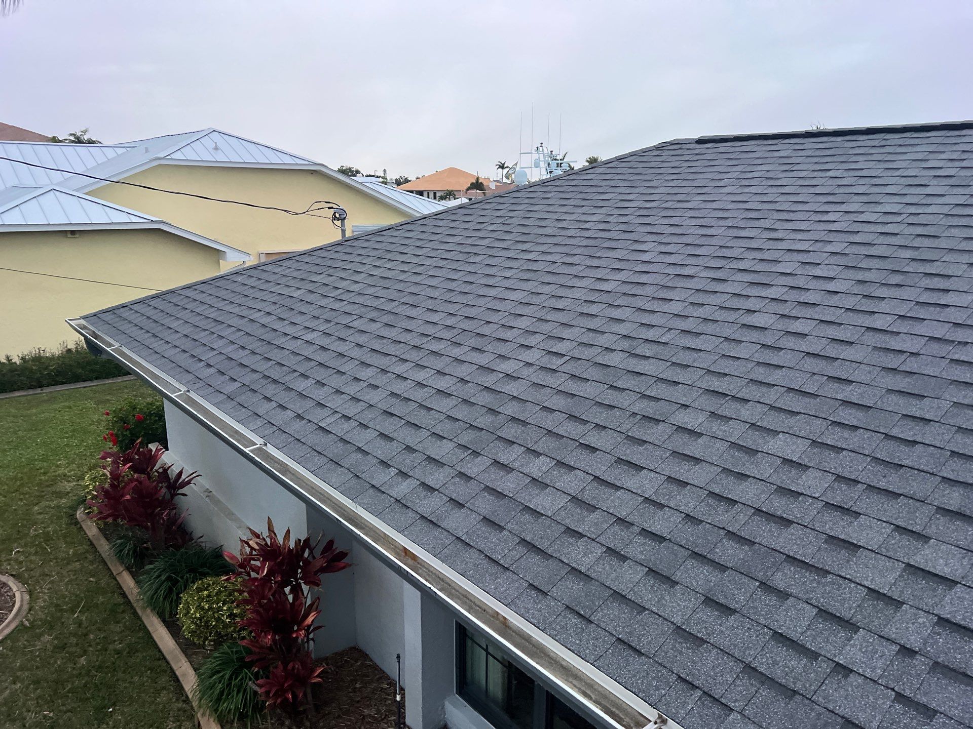 Residential Roofing Installation using Pinnacle Pristine Shingle in Pewter Gray by Durabilis Roofing INC
