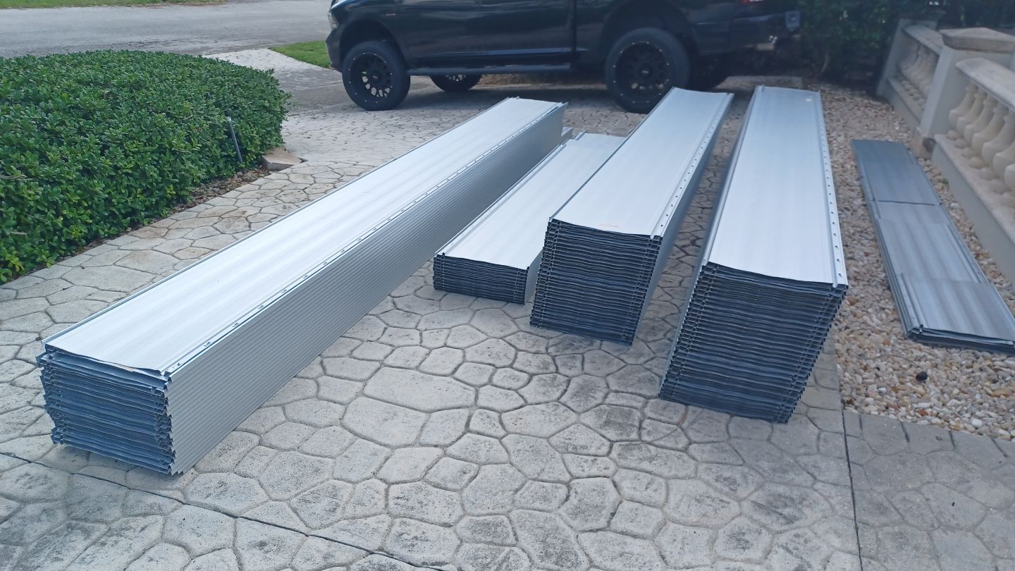 Residential Roofing Installation using 1" Nail strip metal roof by BLUES BROTHERS ROOFING