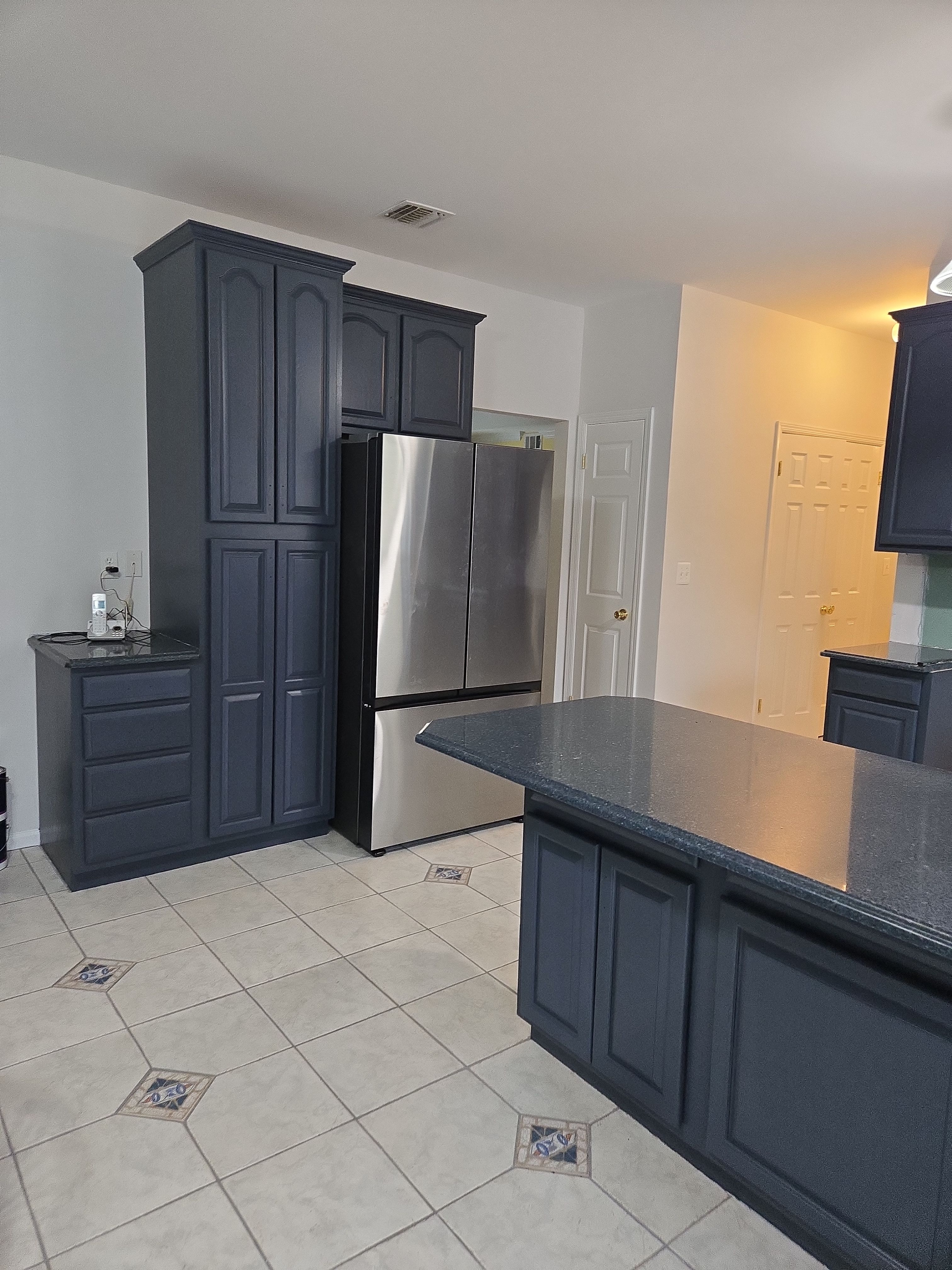 Cabinet Refinishing using Benjamin Moore Command by Spectrum Painting, LLC