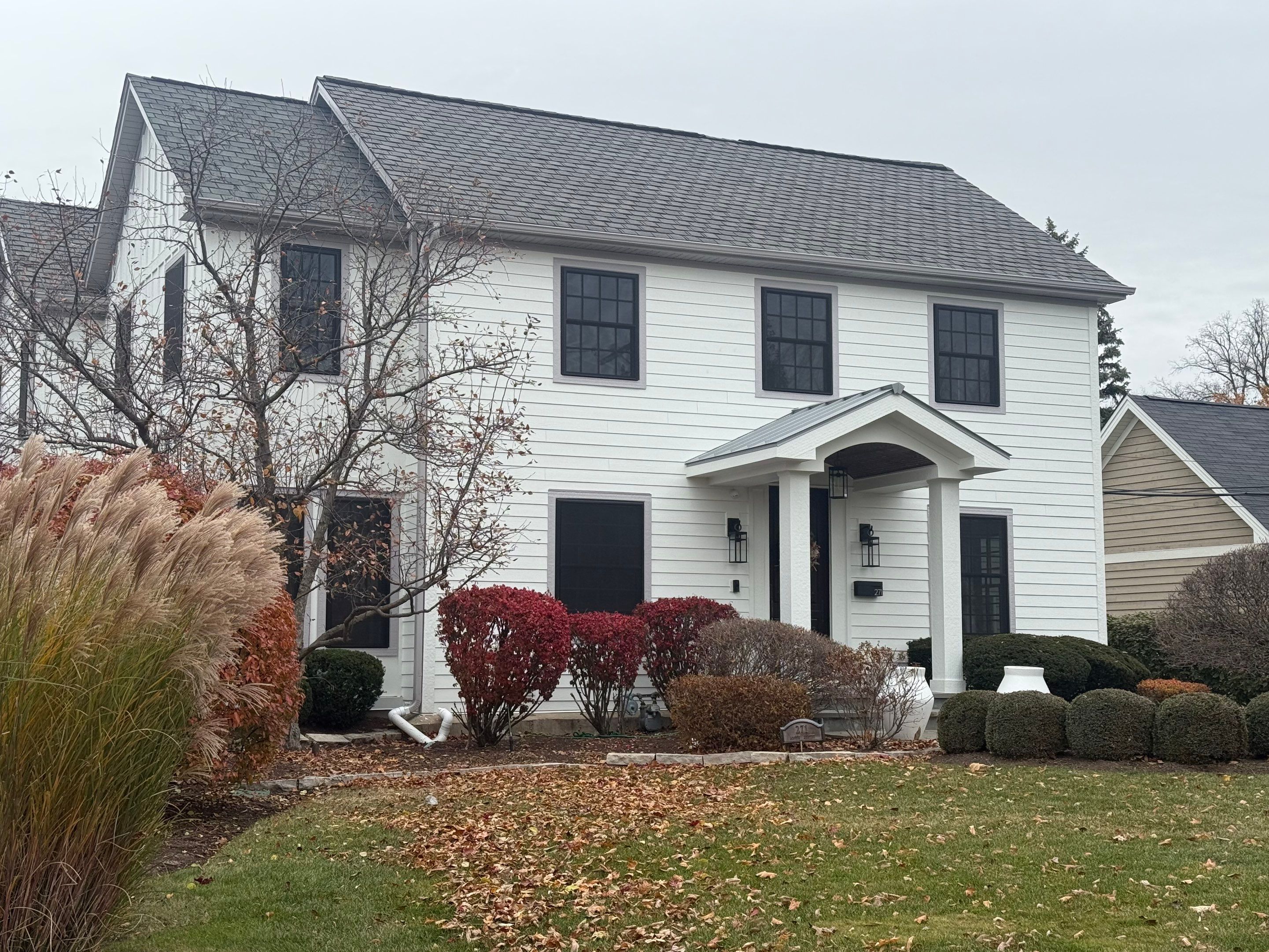 Exterior Renovation in Elmhurst with James Hardie Siding and Windows by Great American Exteriors