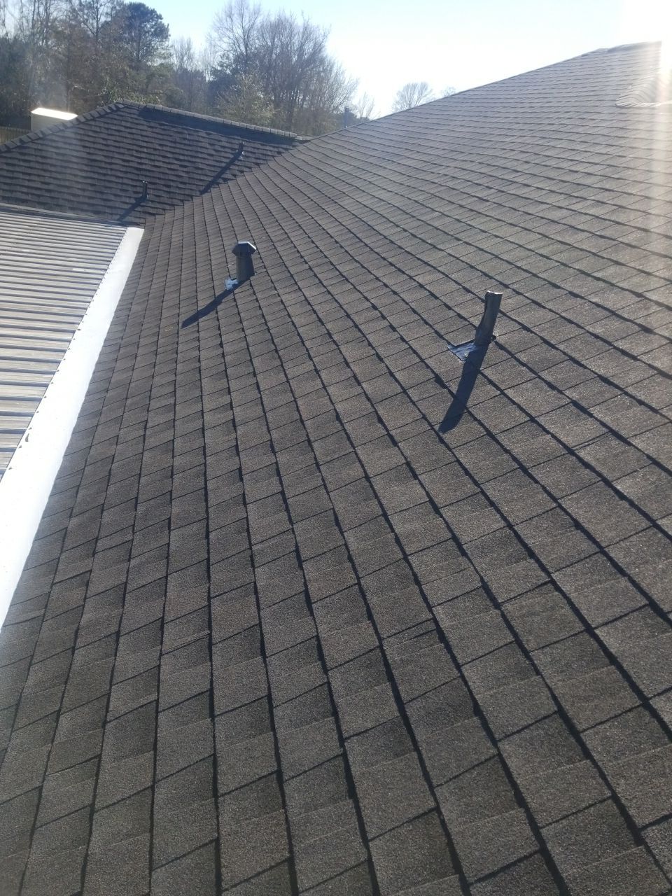 Residential Roofing Installation using Roof Replacement by American Roofing & Construction LLC