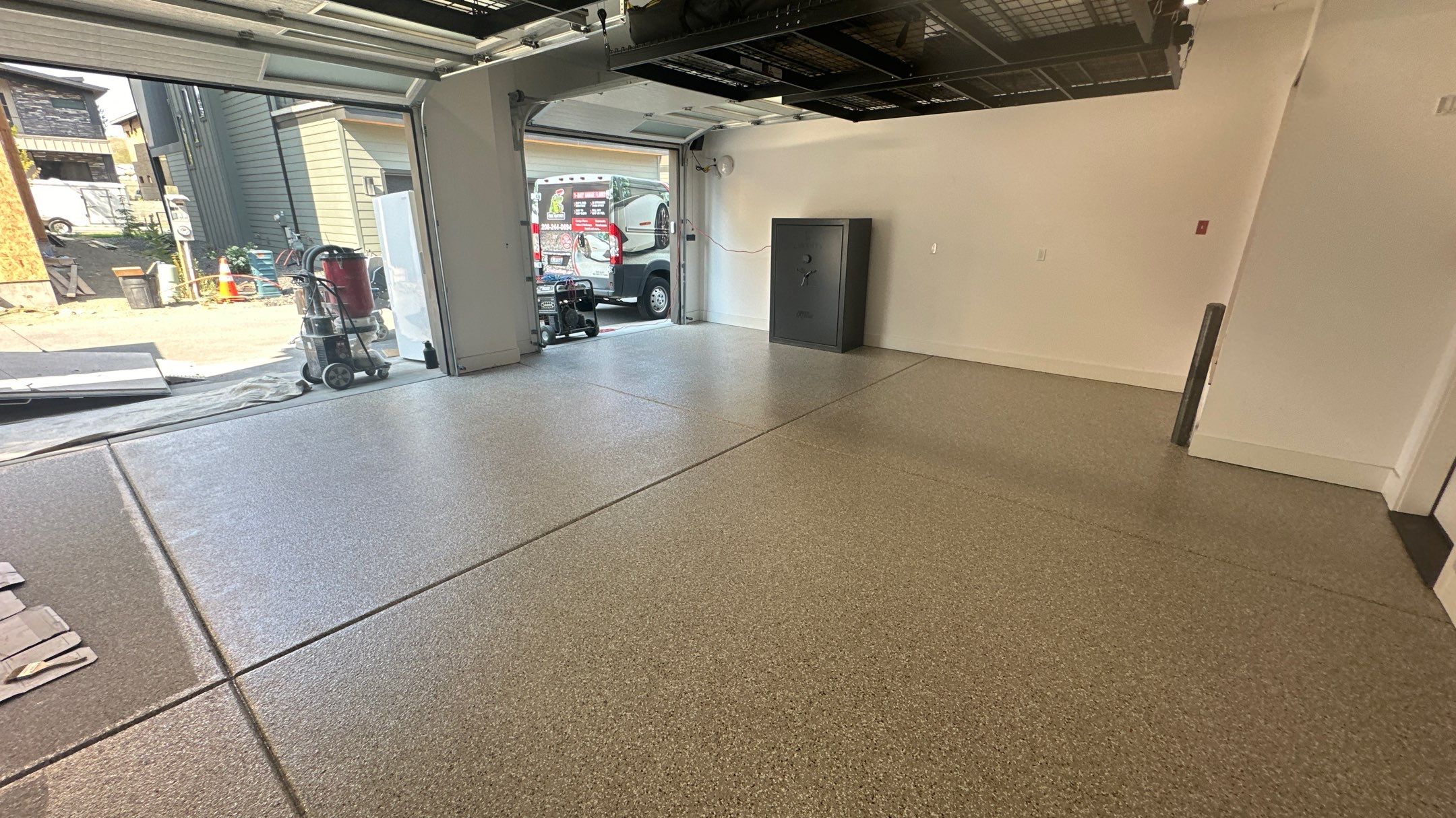 Garage Transformation using Pebble Beach by Croc Coatings, LLC