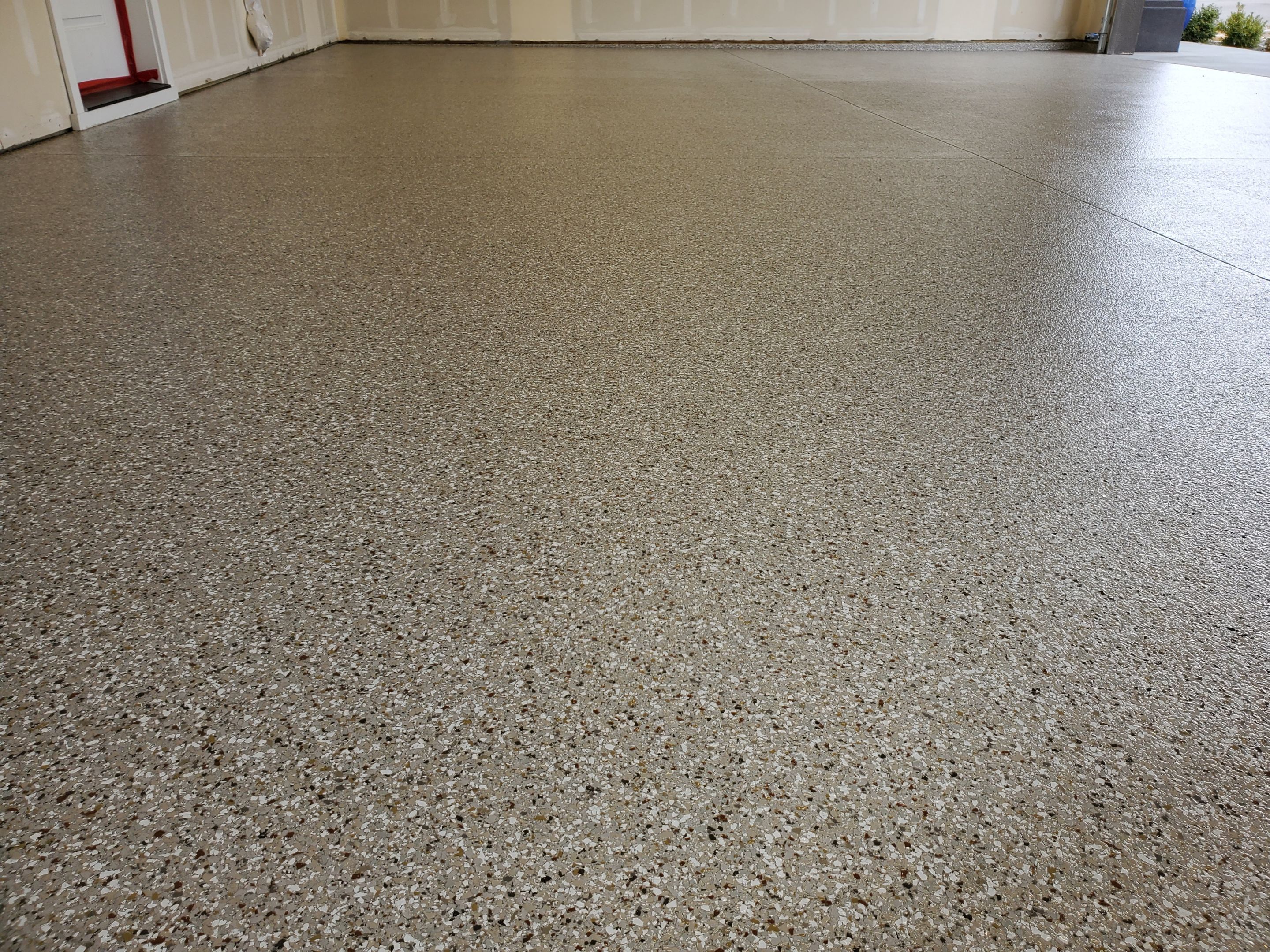 Garage Transformation using Pebble Beach by Croc Coatings, LLC