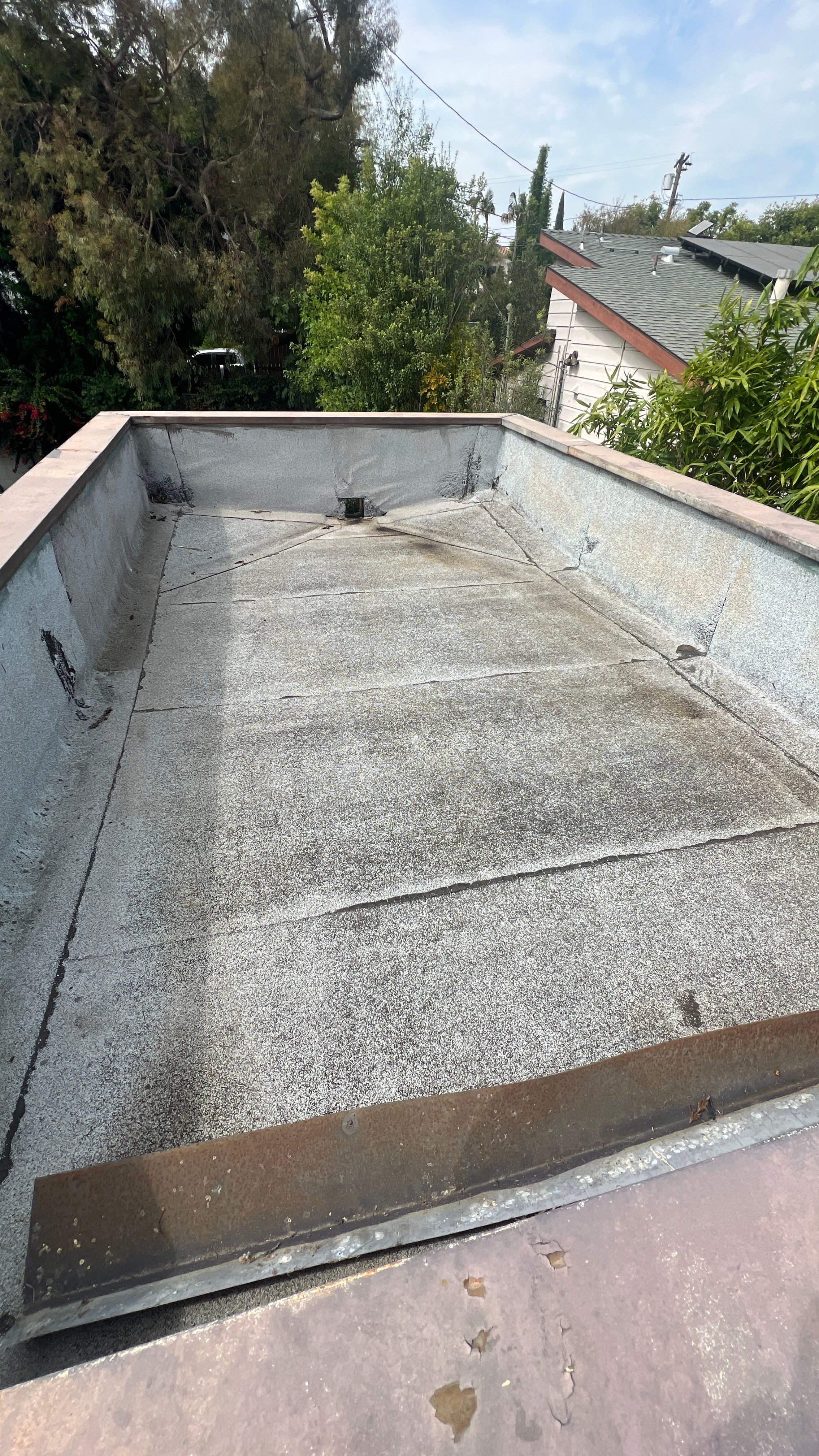 Residential Roofing Installation using Shingles and Silicone by Hull Brothers Roofing