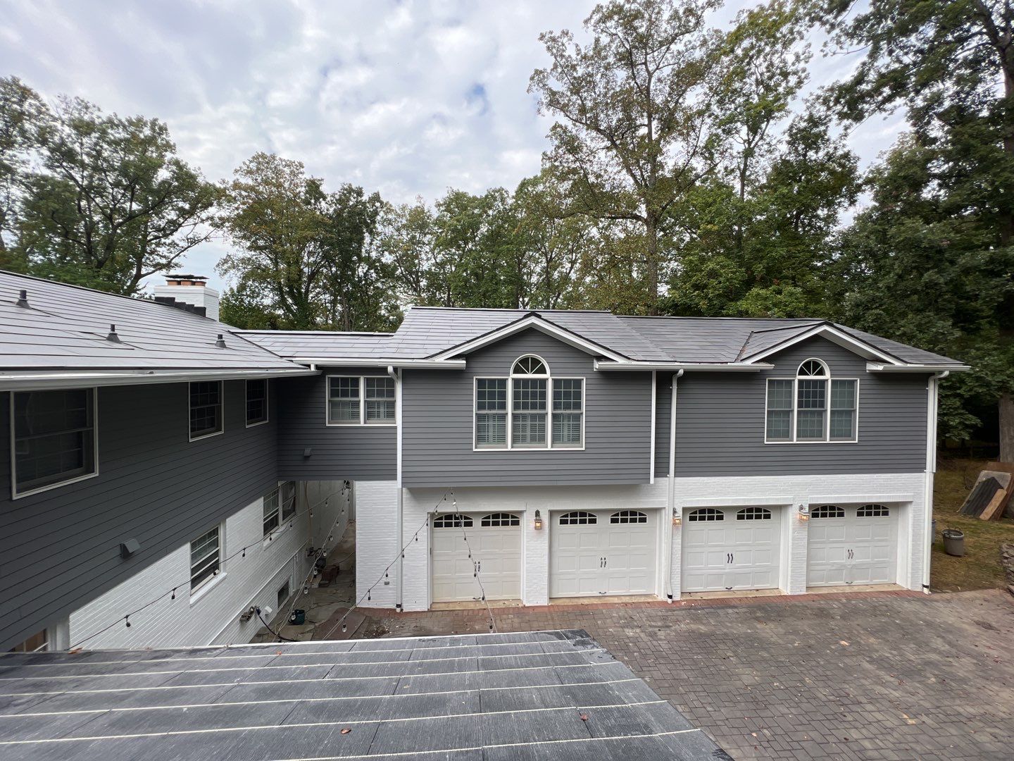 Tesla Solar Roof Replacement using Tesla Solar Roof V3 Tiles by American Home Contractors