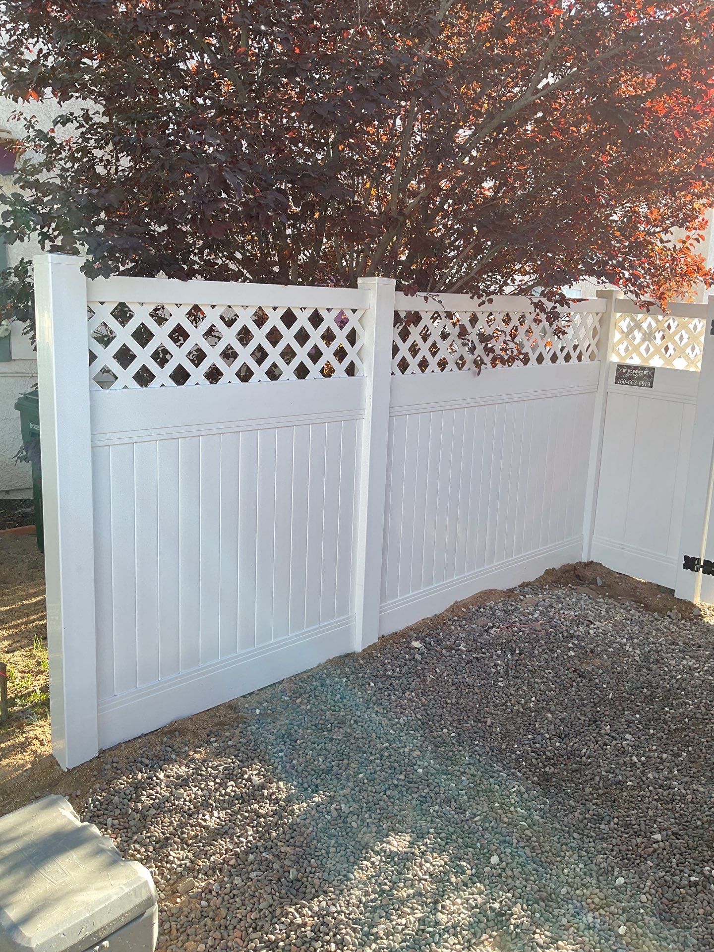 Lattice Vinyl with Privacy Vinyl Fence by Fence Guys Inc.