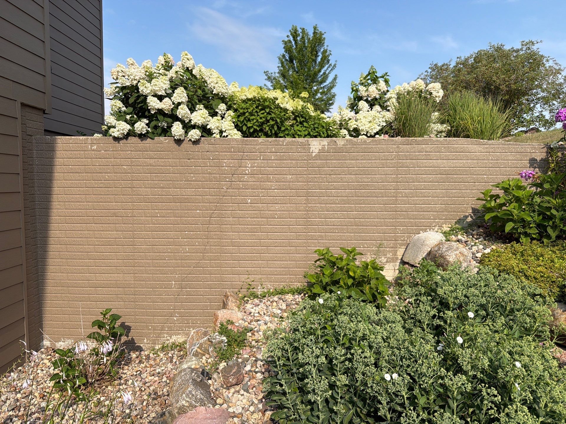 Sioux Falls Residential Exterior Painting and Siding Refresh by Select Painting, Coatings & Garage Cabinets