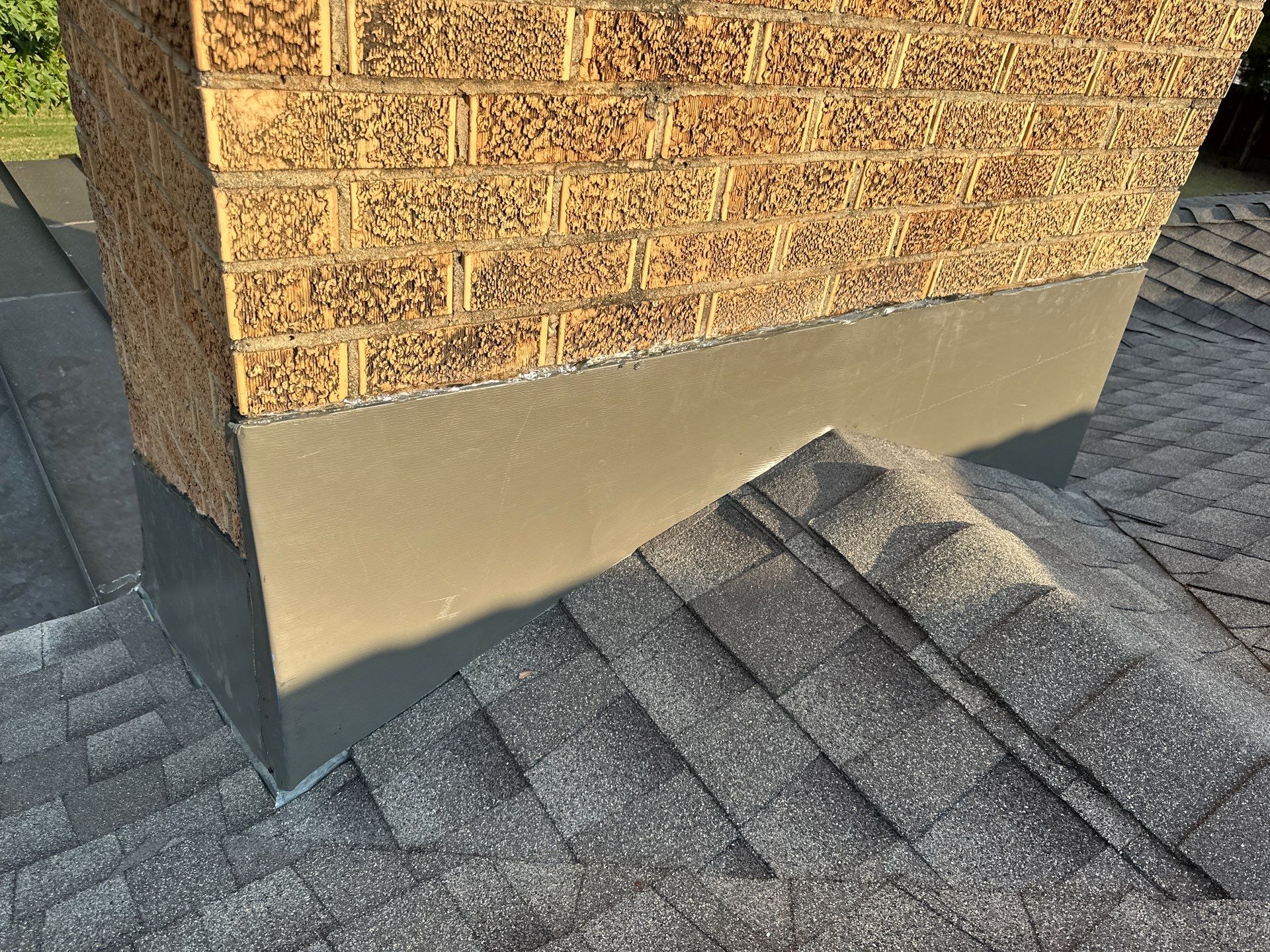 roof replacement, chimney flashing repair, and skylight replacement in Oklahoma City by McCann's Roofing and Construction