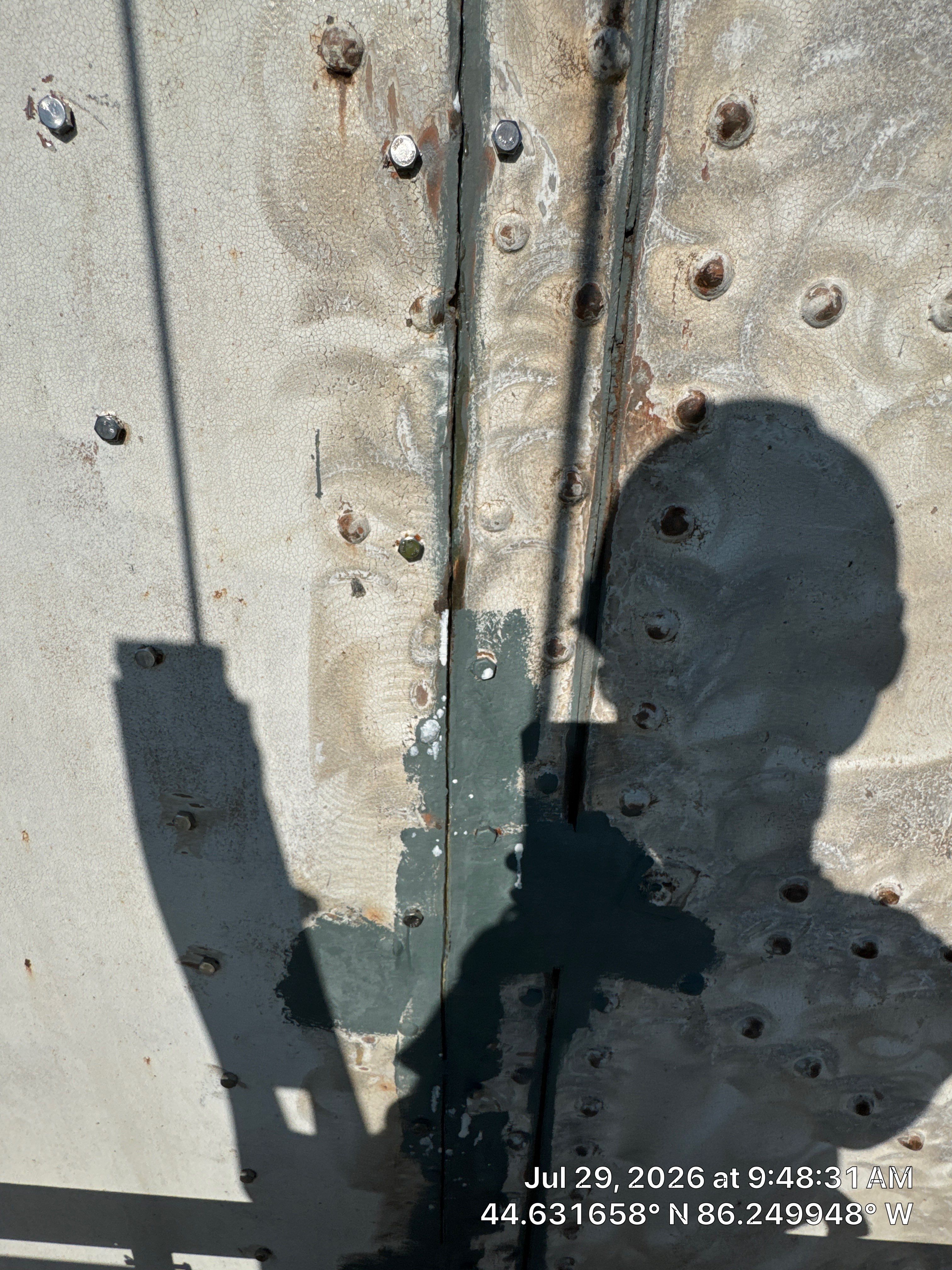 Historical Restoration and Coating of Frankfort North Breakwater Lighthouse by Finkle Preservation & Construction 