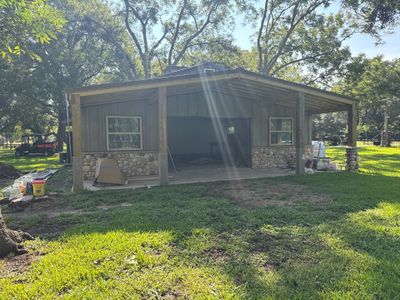 Richmond Addition: River Stone Detailing on a Hacienda Property