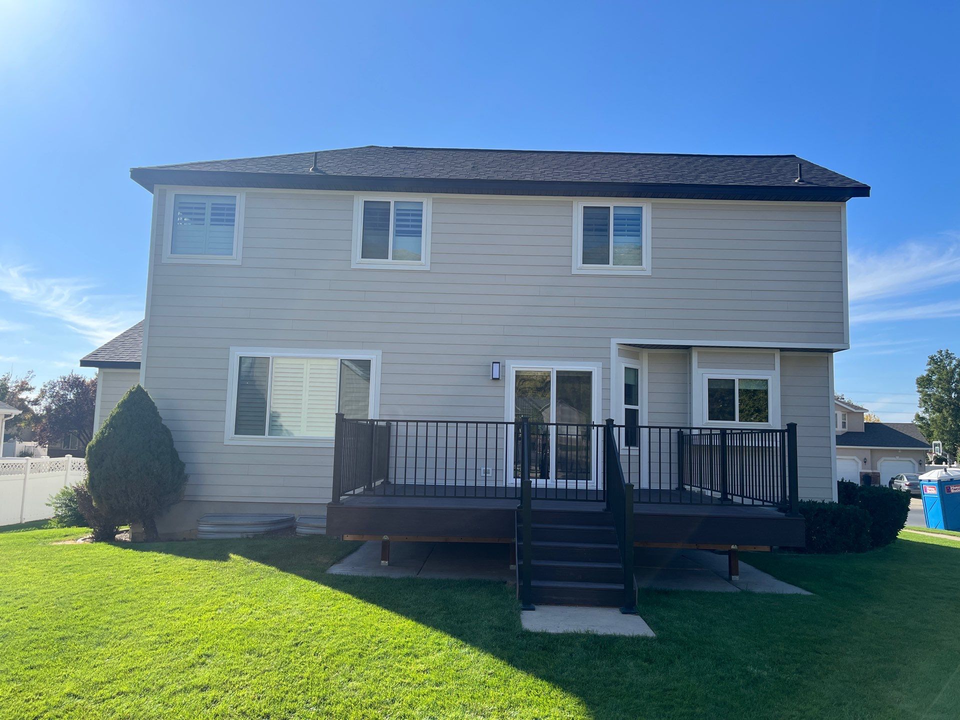 Farmington | Stucco/Vinyl Demo & Hardie Conversion | Cobble Stone & Black by Ideal Siding Utah