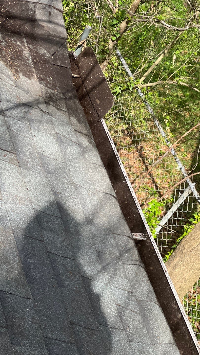 Gutter Cleaning using brown bags by Roof Bullies