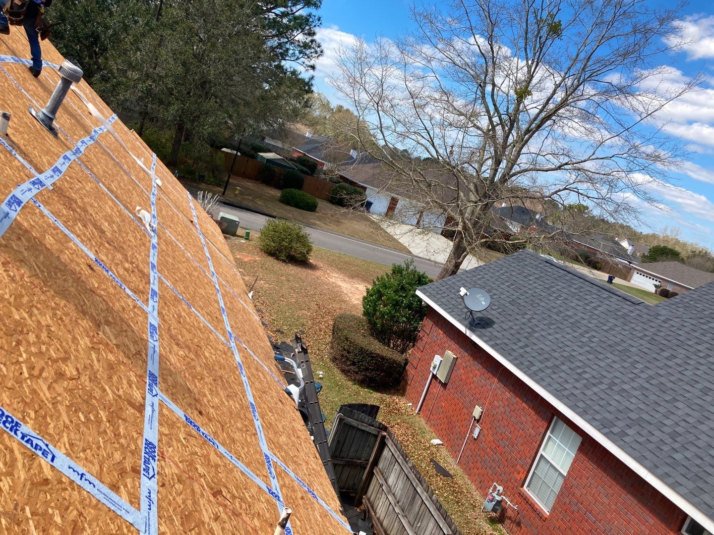 Residential Roofing Installation using Roof Replacement by American Roofing & Construction LLC